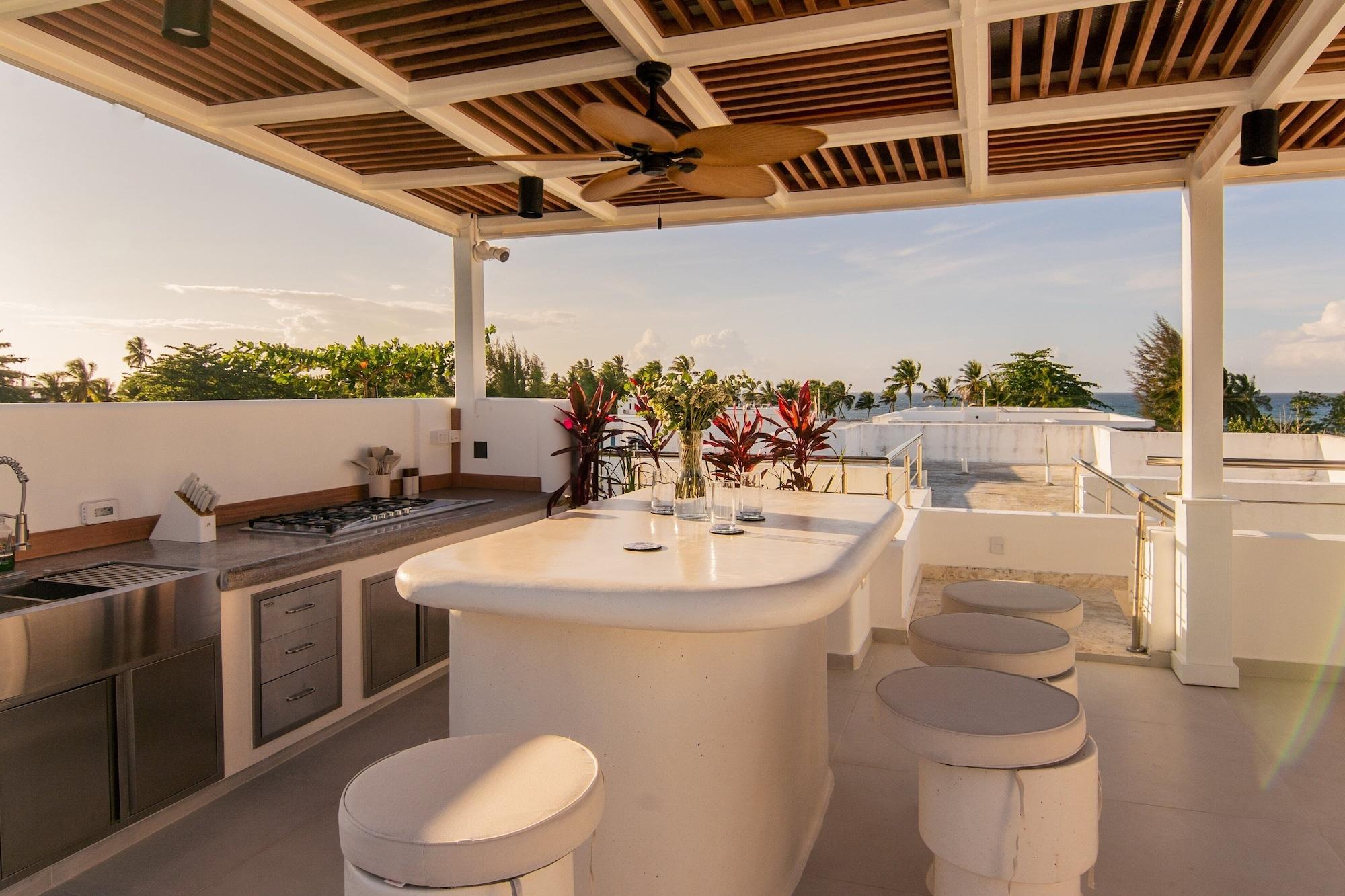 Restaurant New Beachfront Penthouse by RedAwning