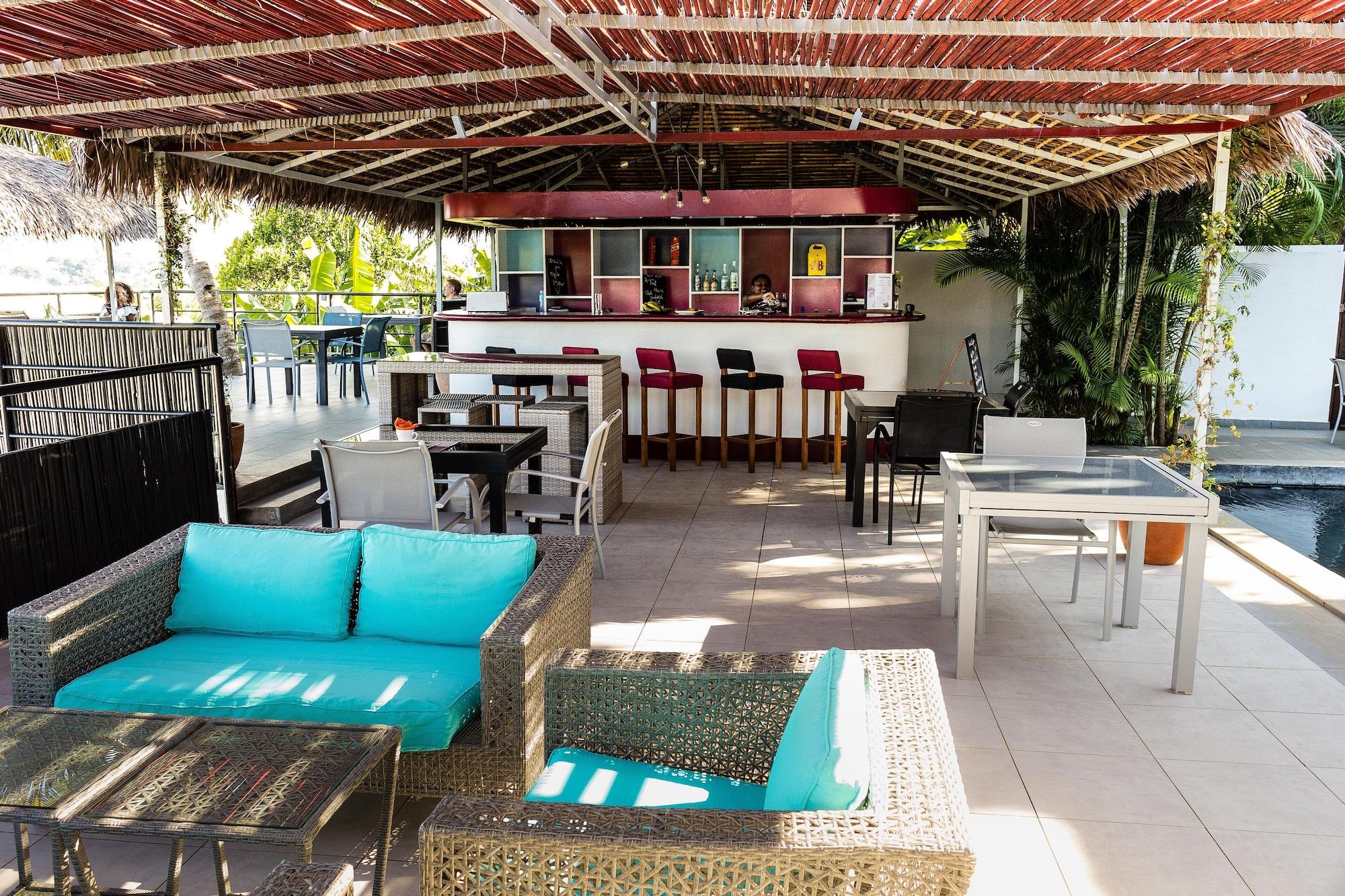 Bar/Salón Villa les Orchidées