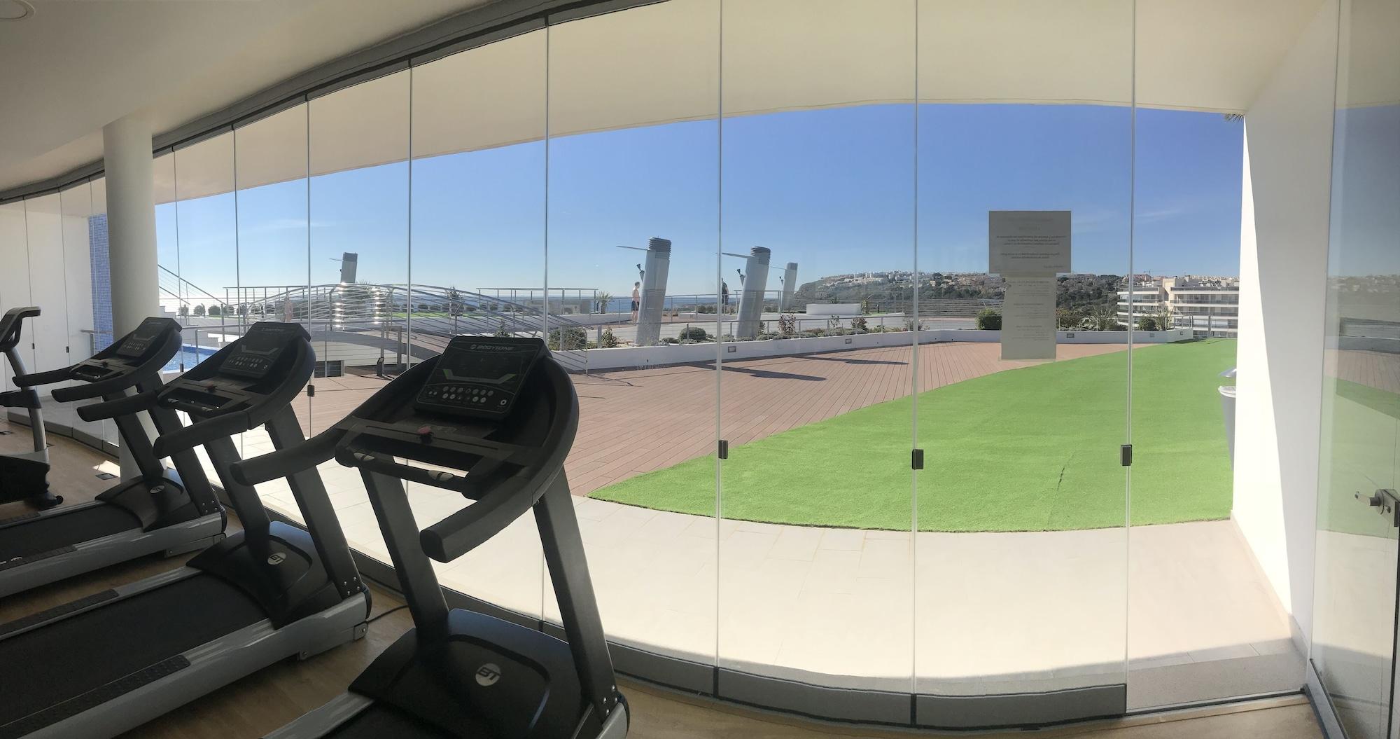 Gimnasio Deluxe Apartment Arenales del Sol Beach