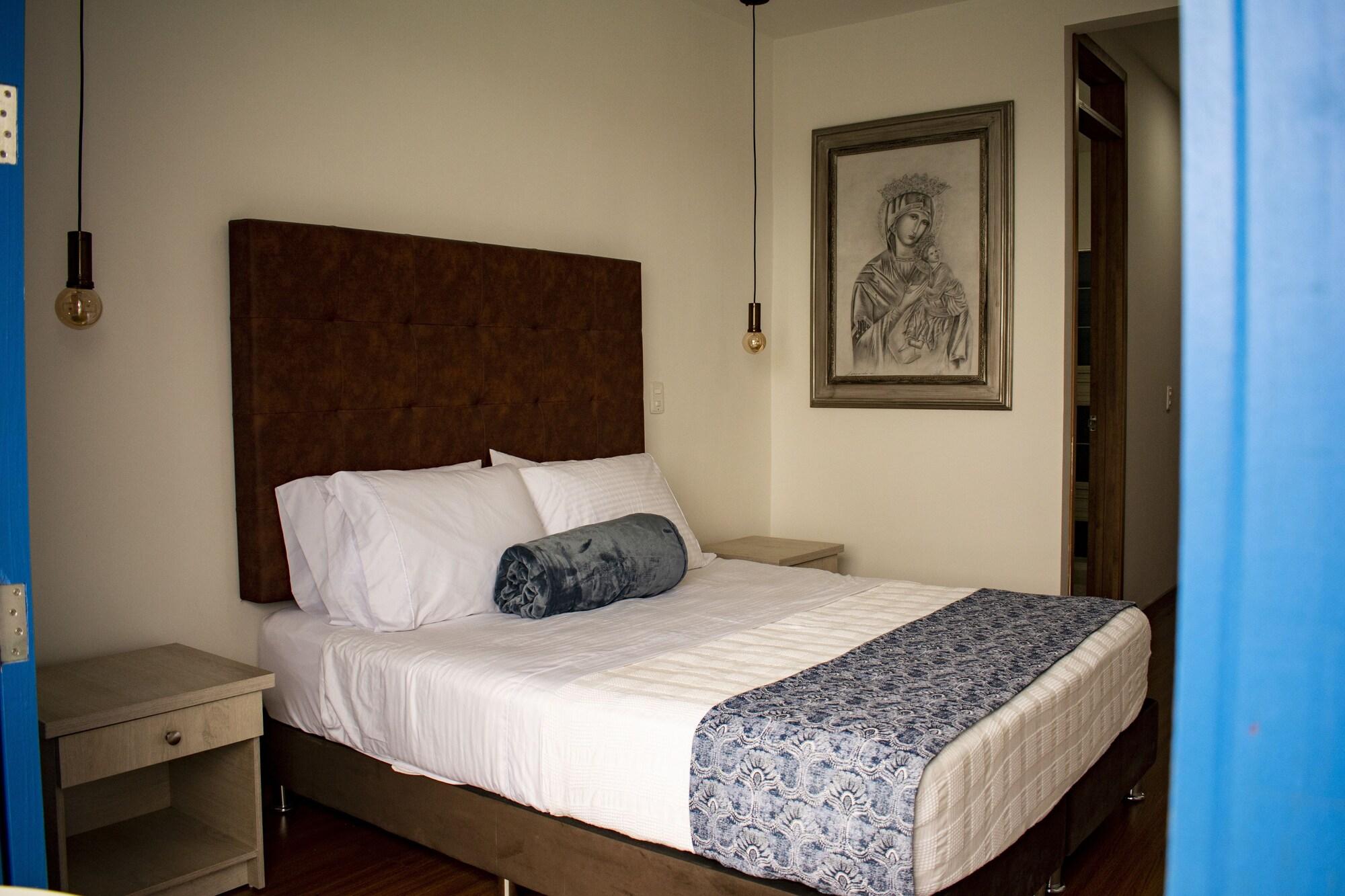 Habitación El reloj casa hotel