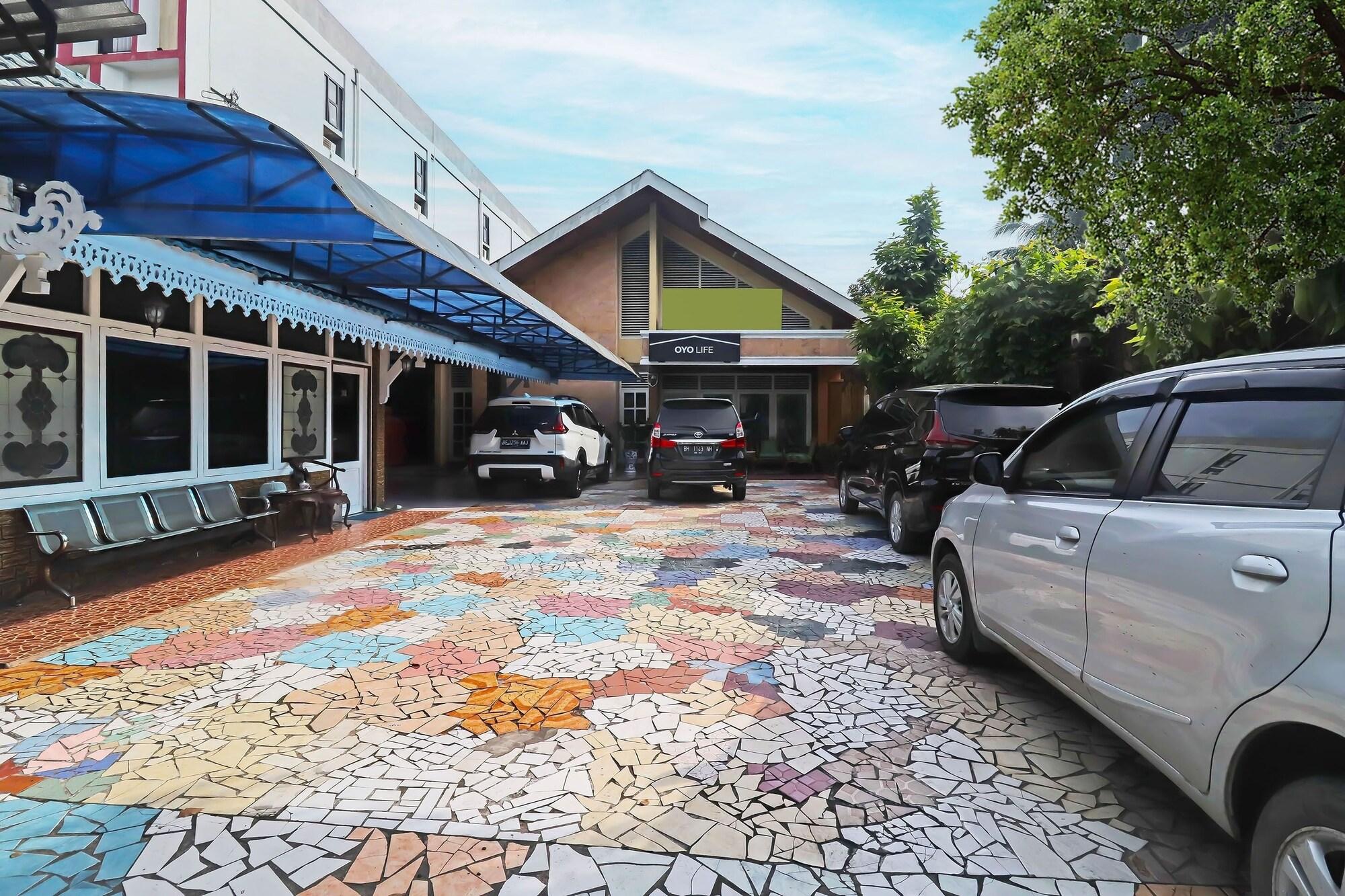 Varios OYO 2899 Ardilia Bandara Syariah
