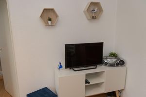 Arriendo temporal - Apartment for 2 persons near dike with terrace, ground level, dogs welcome!