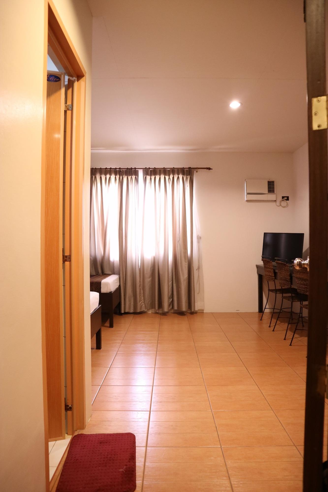 Habitación Casa Palmeras Hotel