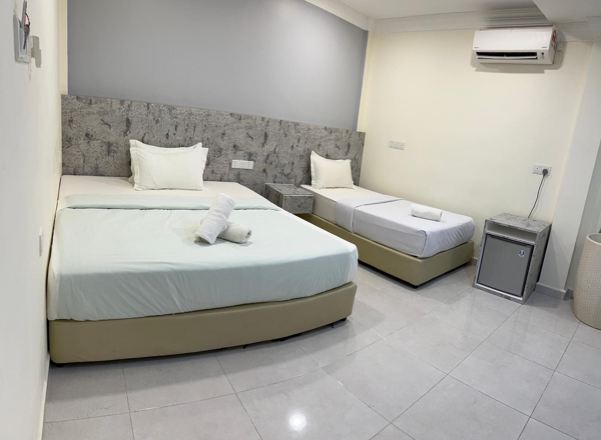 Habitación Dlima Beach Inn