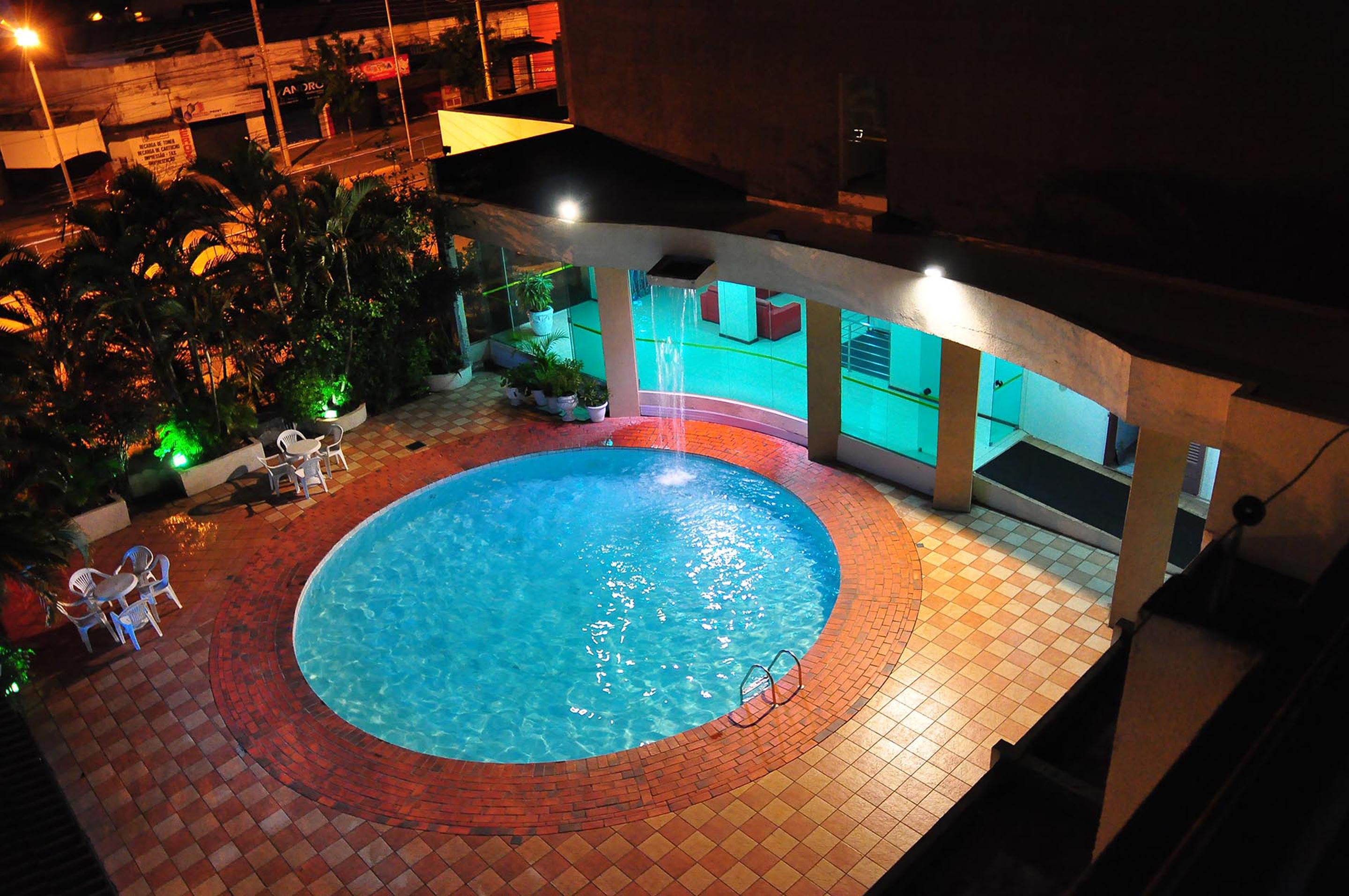 Vista da piscina Biss Inn Hotel