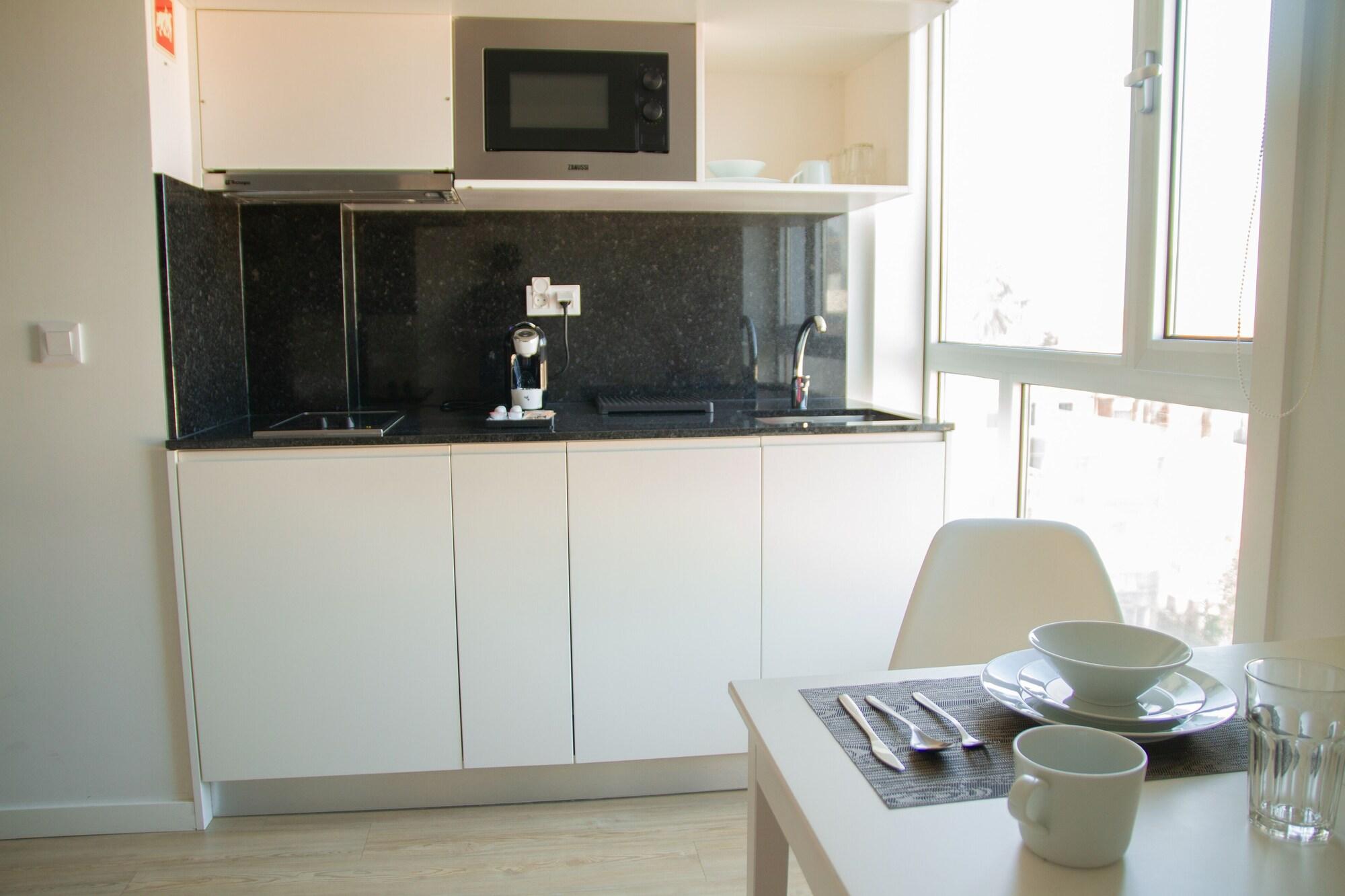 Equipamiento de Habitación Room Select Porto Suites