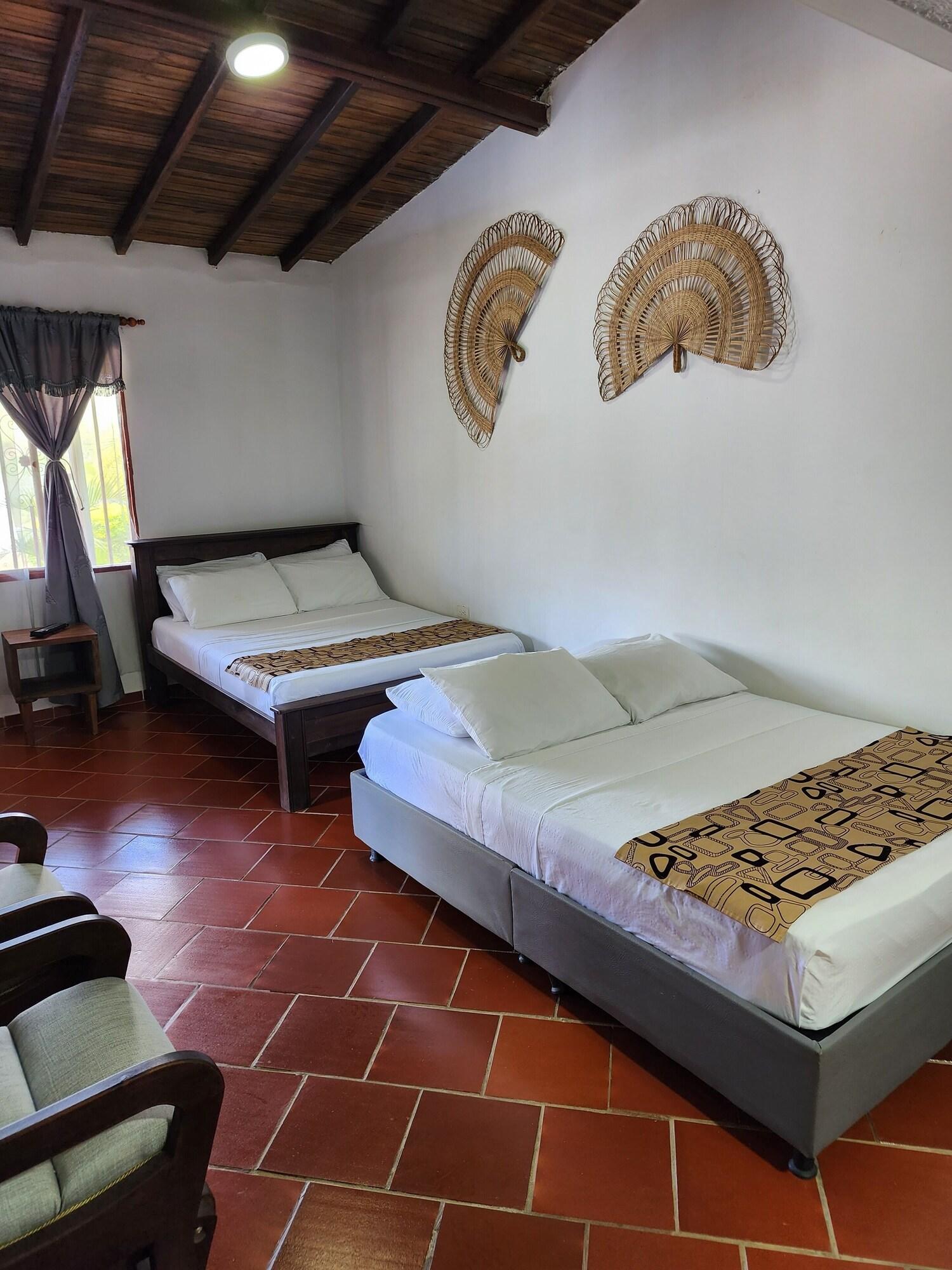 Habitación Hotel campestre palmas del zamorano