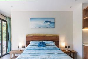 Renta Vacacional - Cozy studio apartment near beach with roof top pool, AC, WiFi