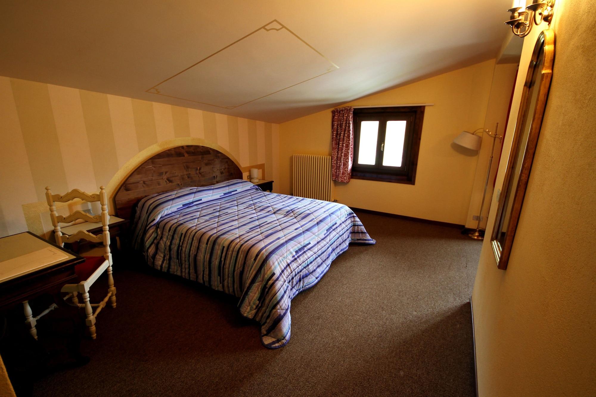 Habitación Hotel Parè