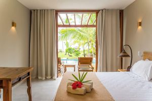 Alquiler Vacacional - Beachfront house with 8 suites, adult and children's pool, and barbecue area.