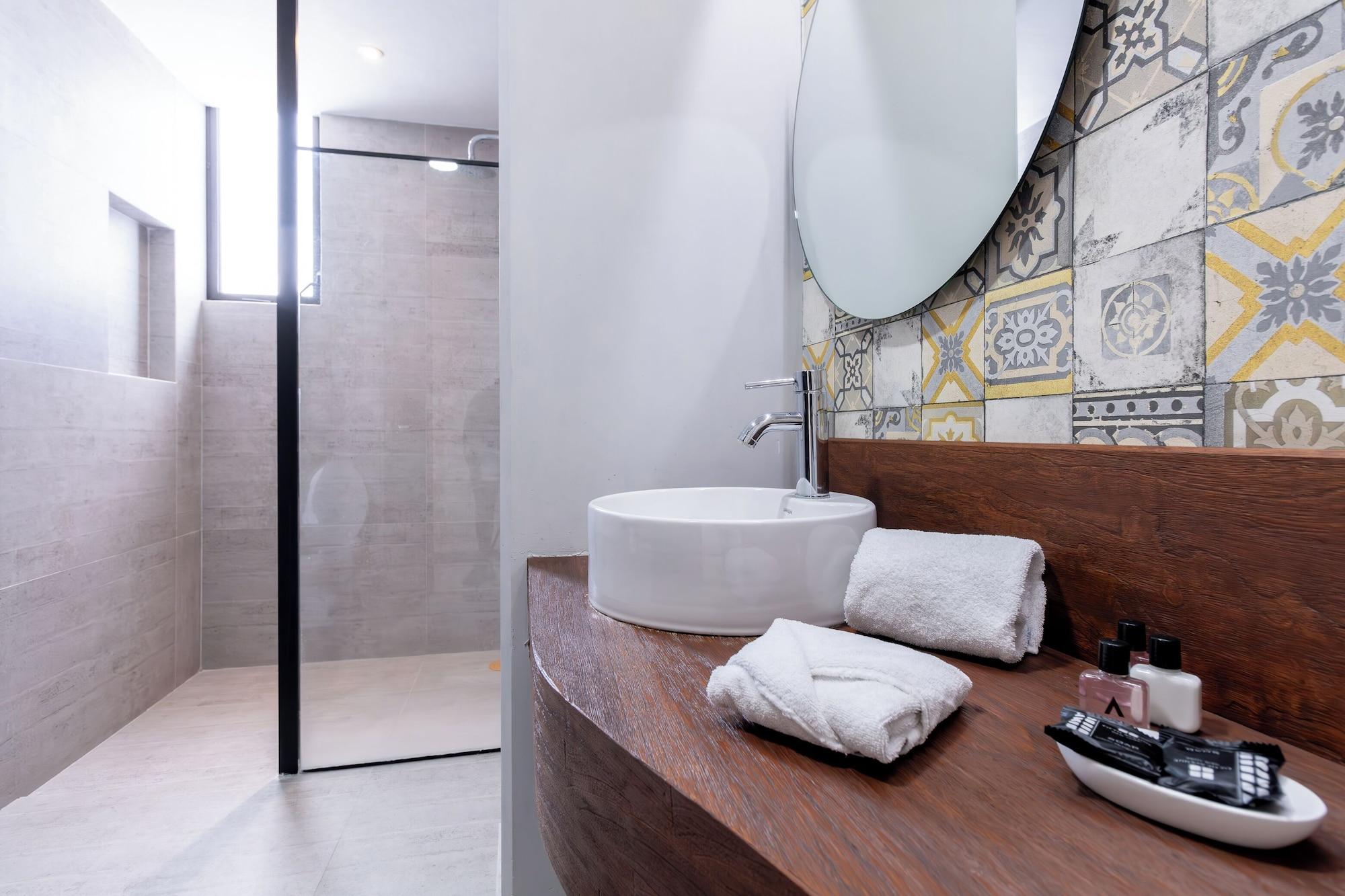 Equipamiento de Habitación Arkana Puebla by Grupo Amber