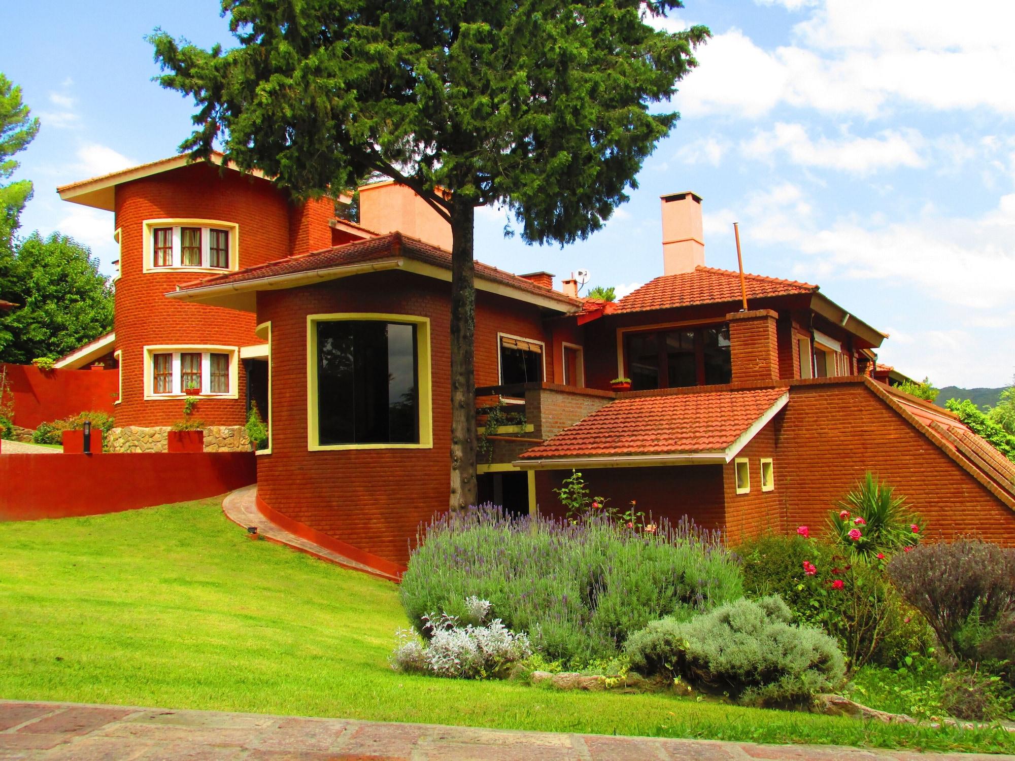 Varios Posada Chalet Suisse