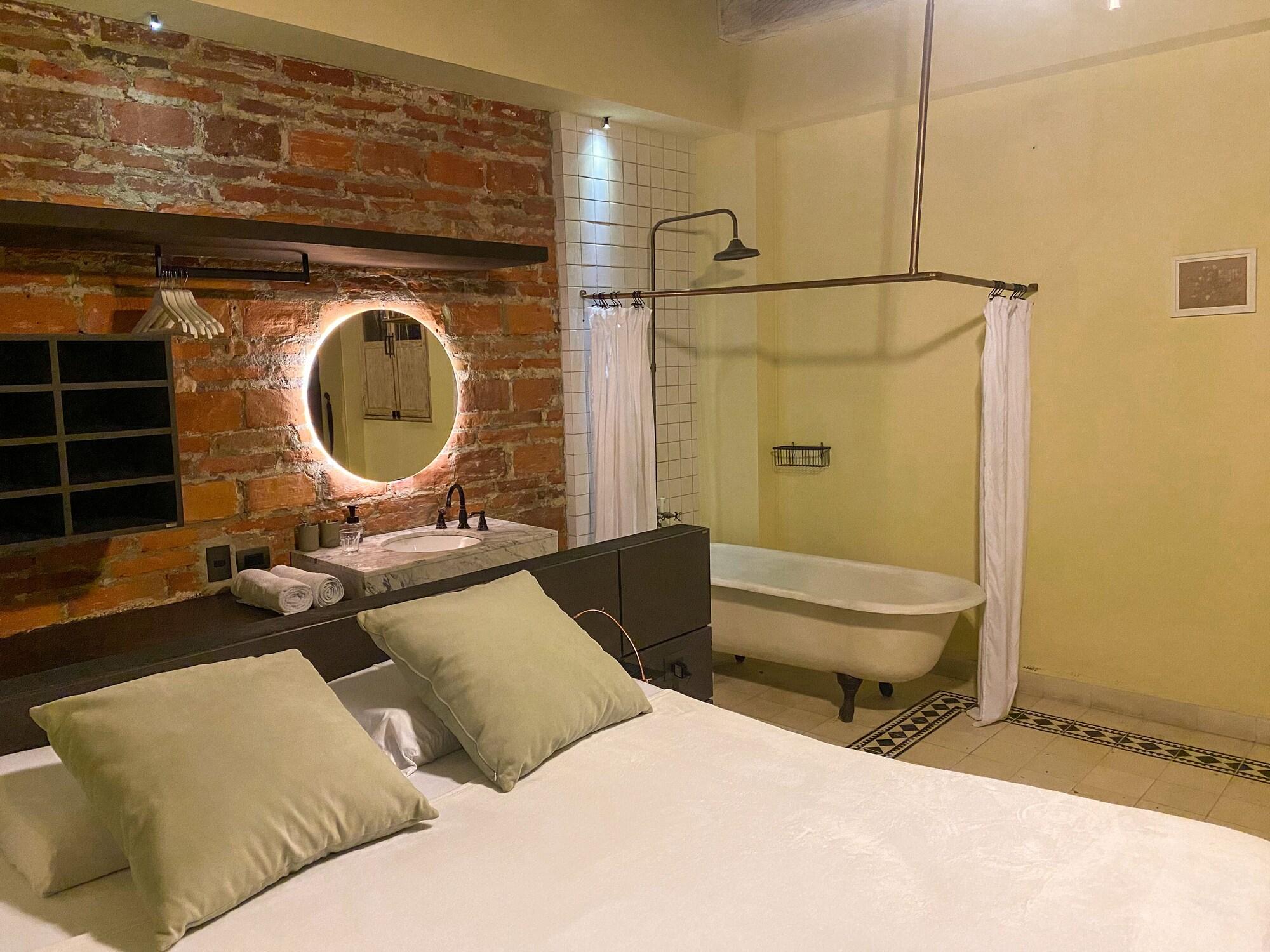 Habitación Casa Charlotte Alma Hotels