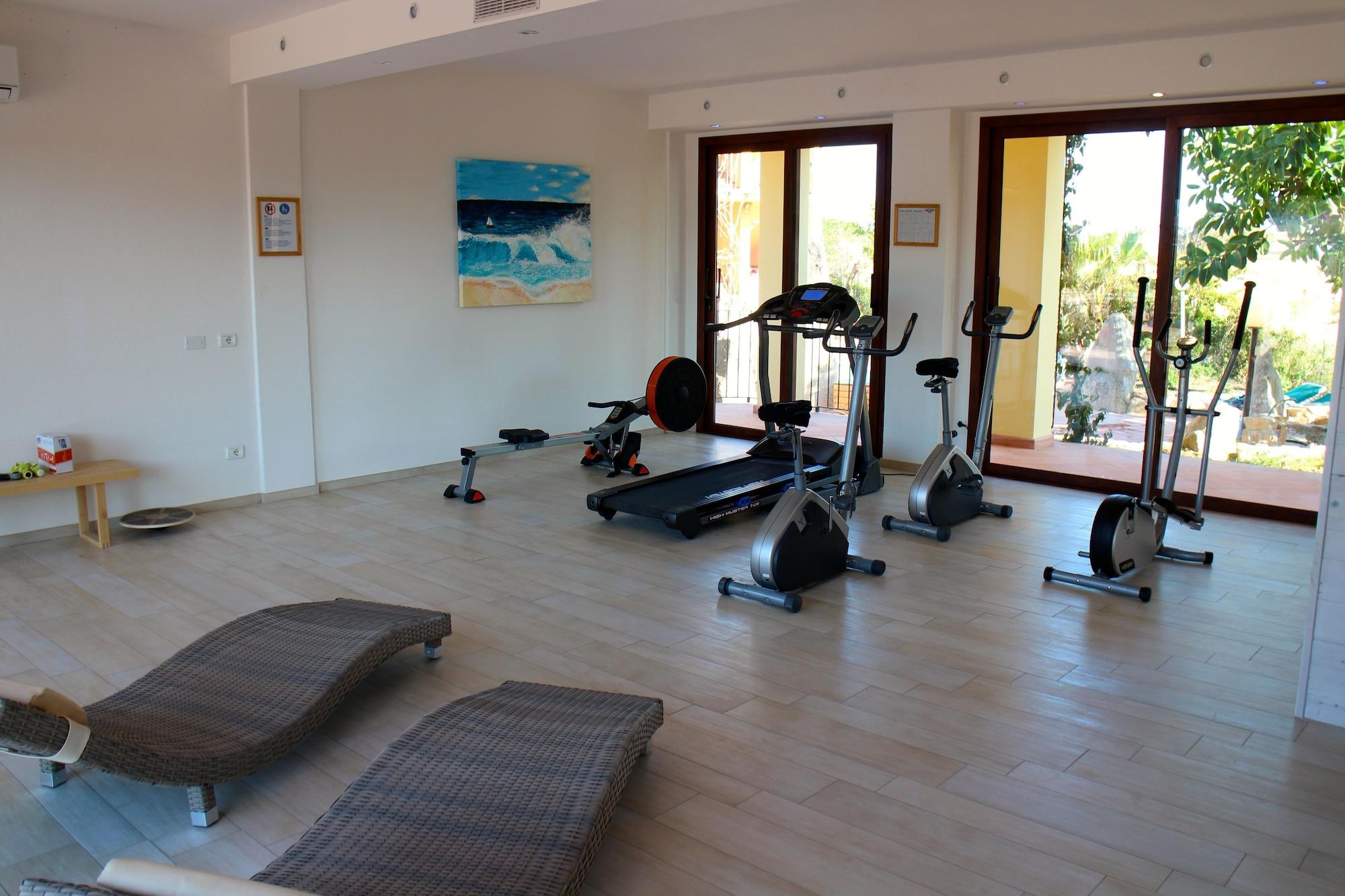 Gimnasio Aparthotel Domus De Janas Sul Mare