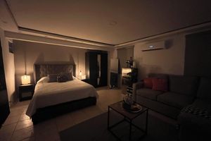 Alquiler Vacacional - Cozy studio with private Pool and Bar modern amentities perfect for relaxation.