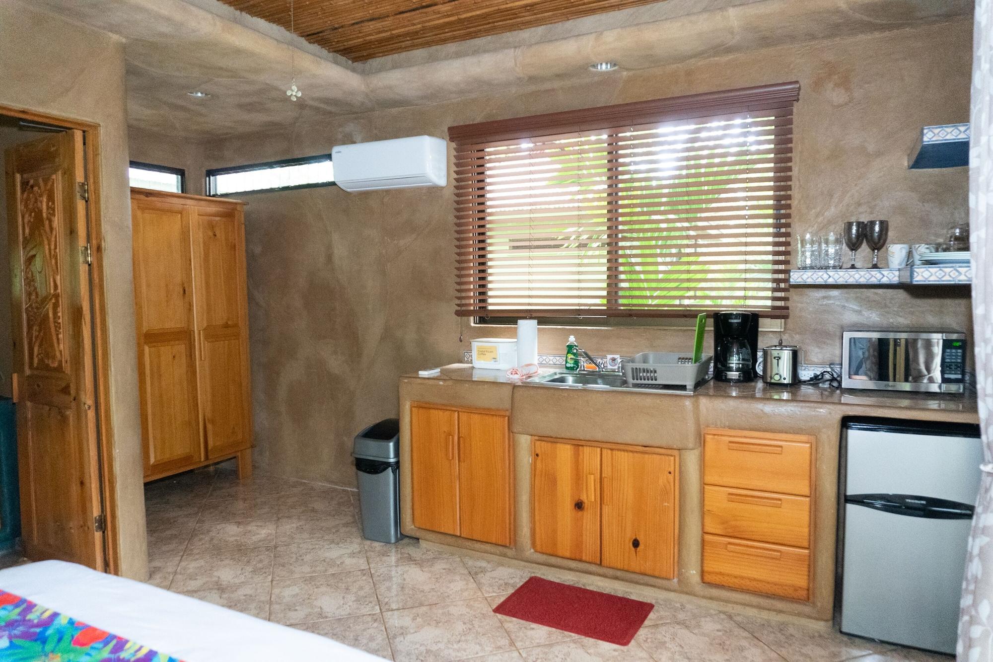 Equipamiento de Habitación Arbol Verde Villas