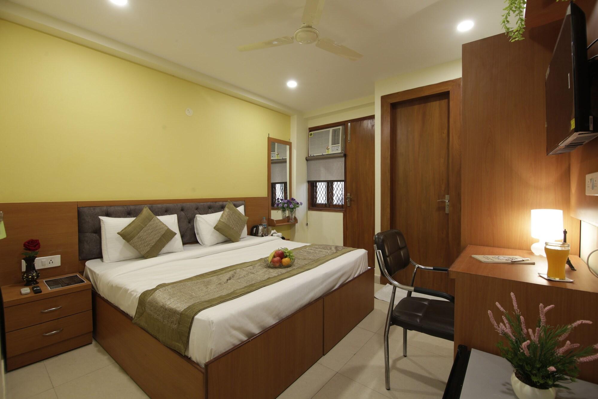 Quarto Hotel TMS Grand