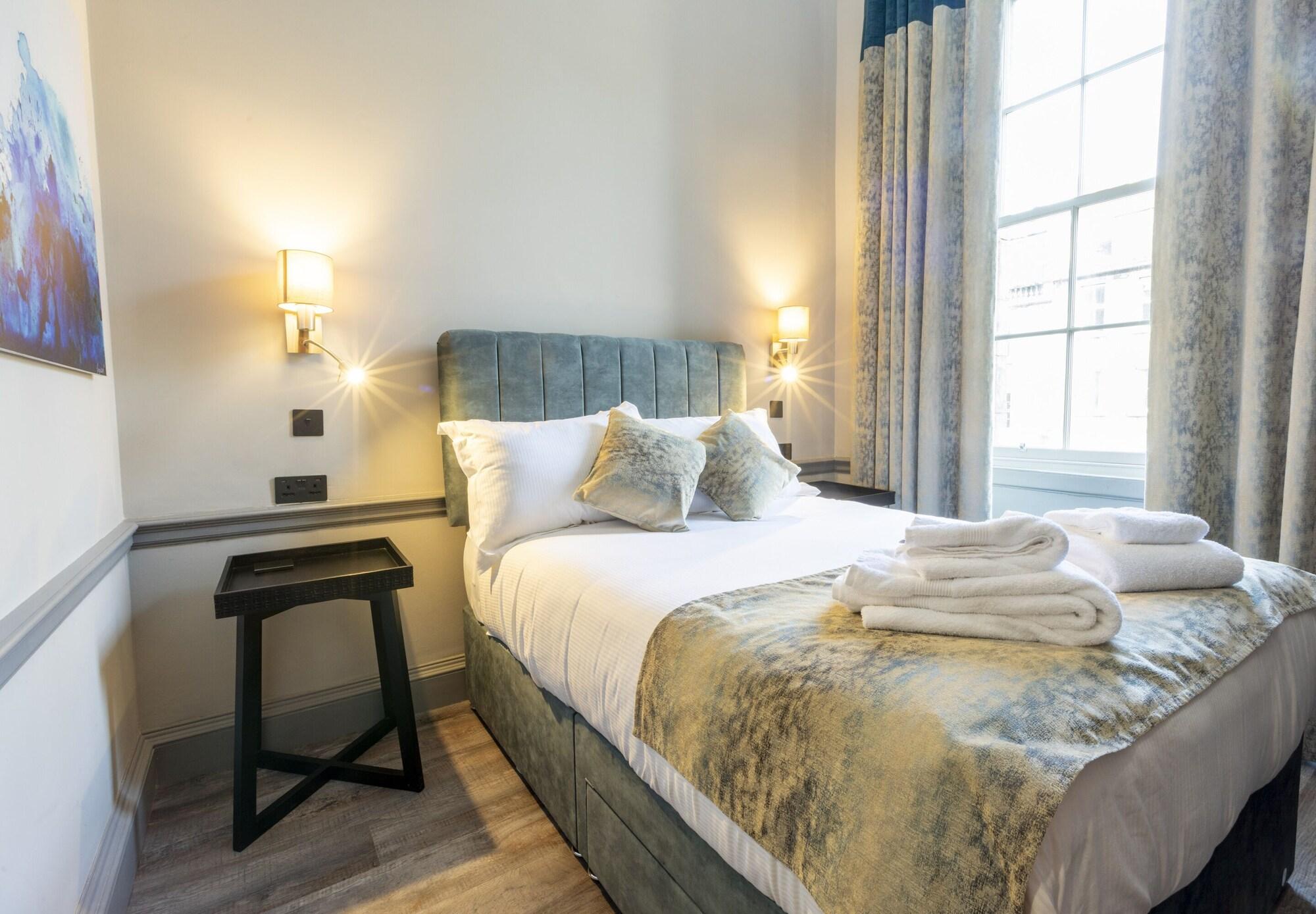 Habitación MONO Suites New Town