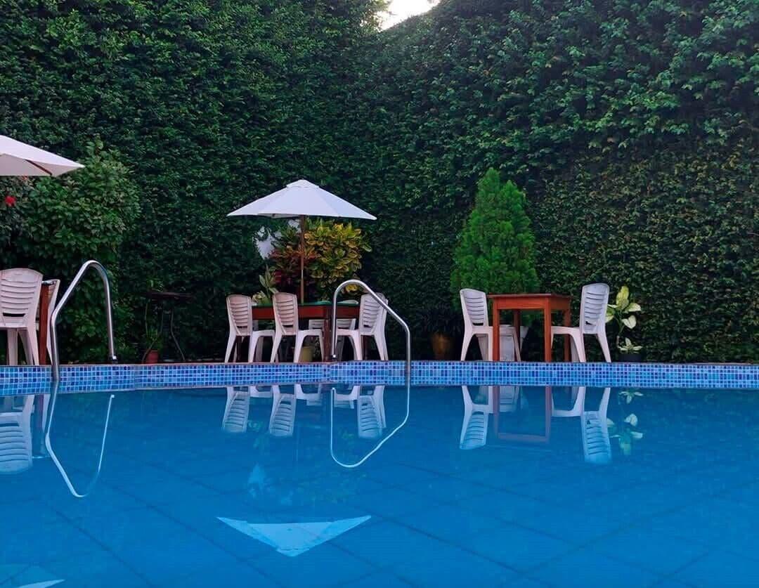 Vista Piscina La Posada Del Cauchero Hotel & Suites