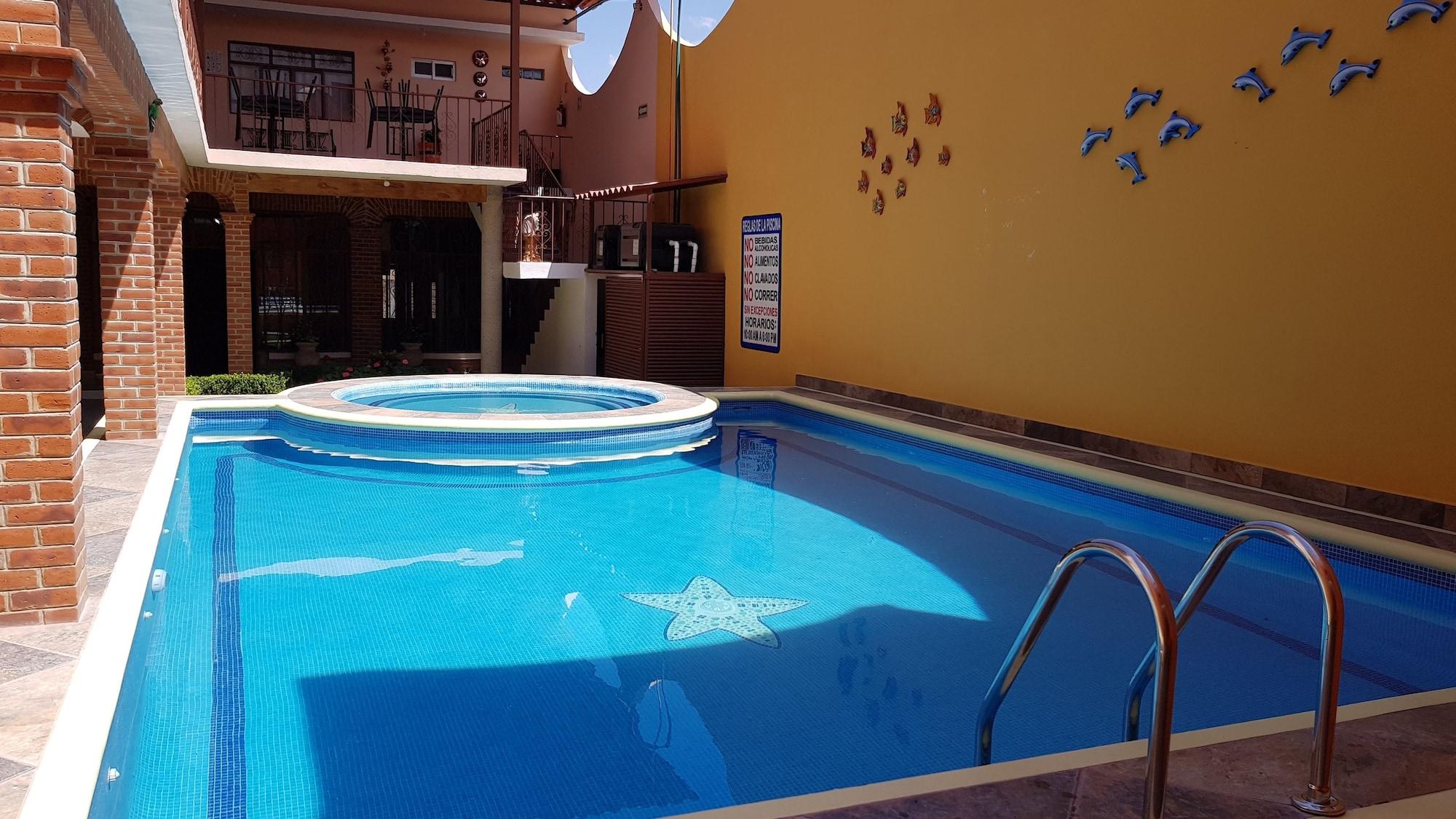 Vista Piscina El Jardin Del Edén