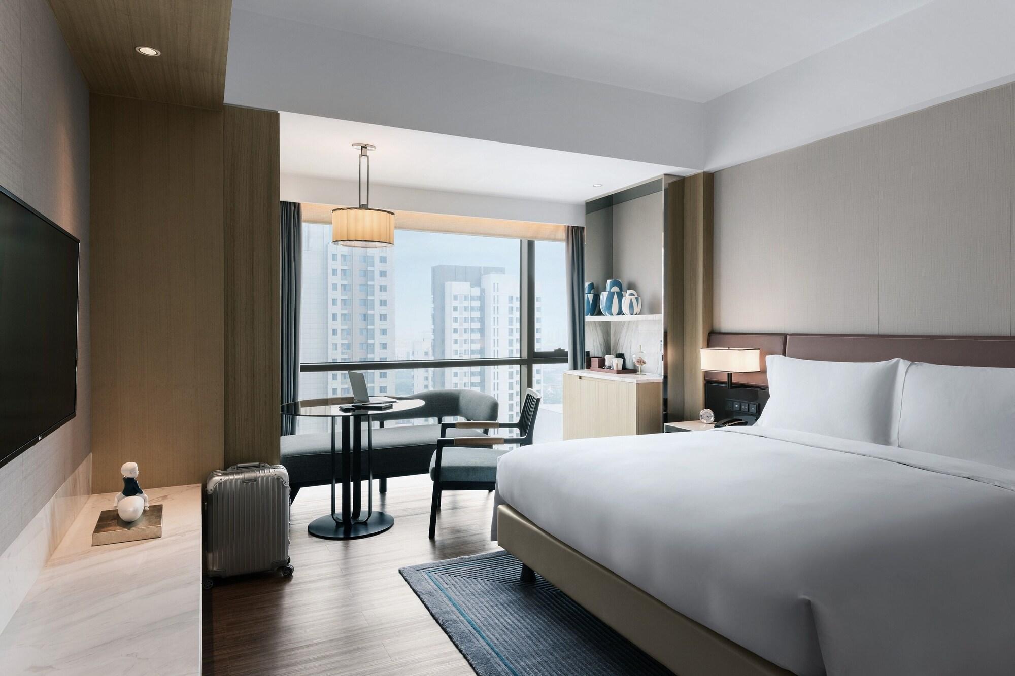 Habitación New World Langfang Hotel