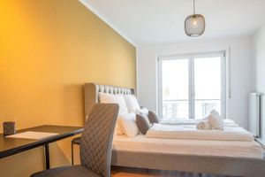 Alquiler Vacacional - FAIRflats - Cozy apartment with kitchen, balcony, parking and elevator