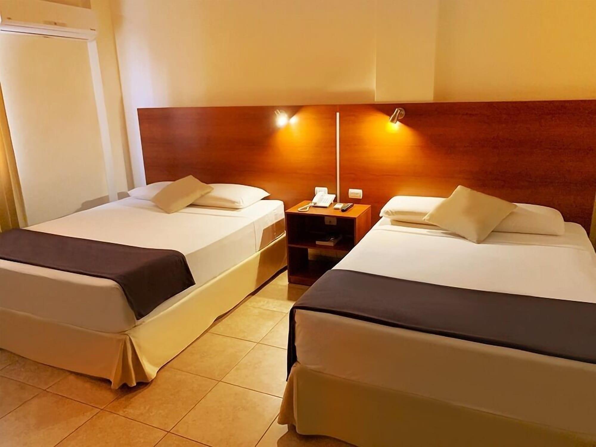 Habitación Hotel Palmira Inn