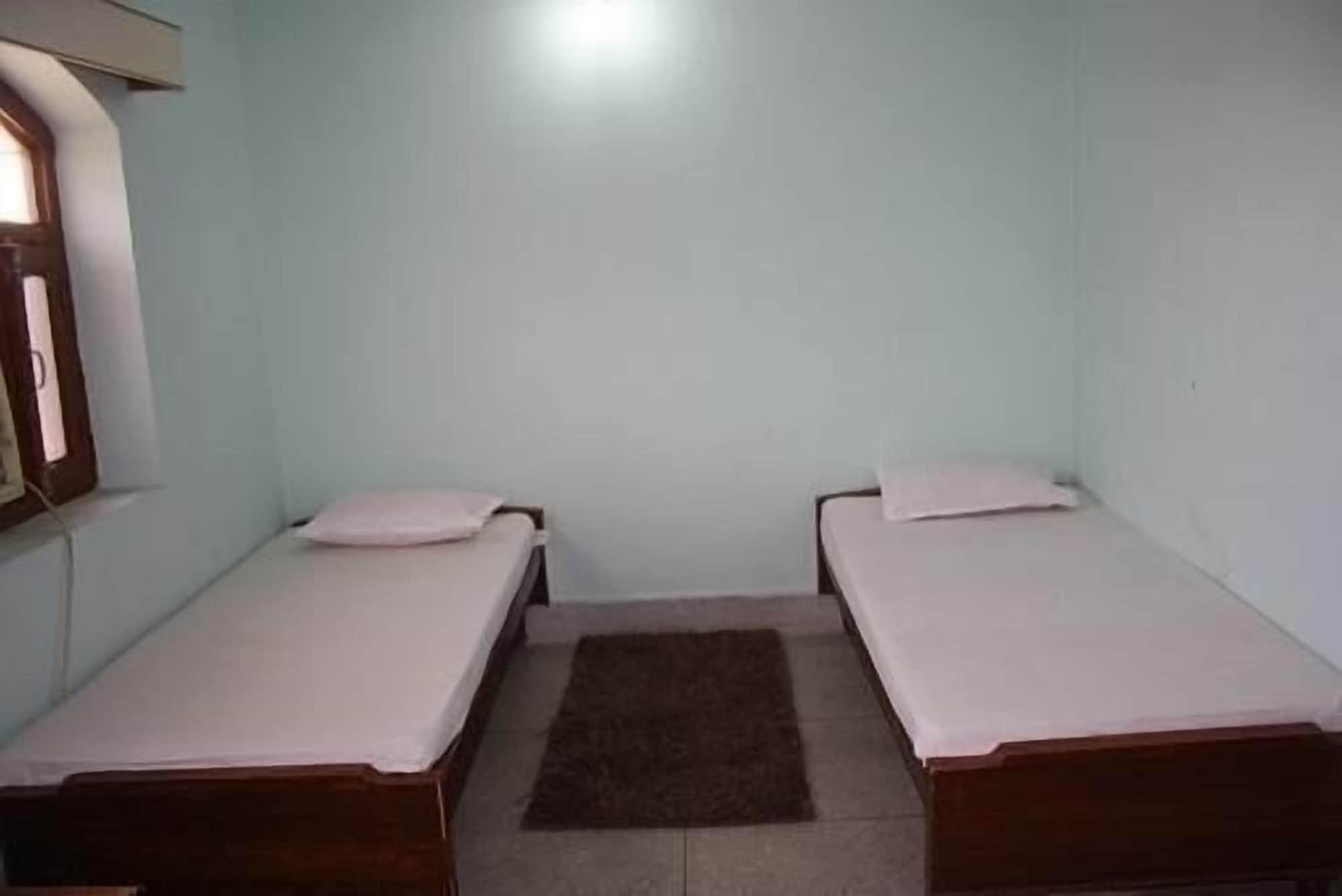 Habitación Rainbow Guest House
