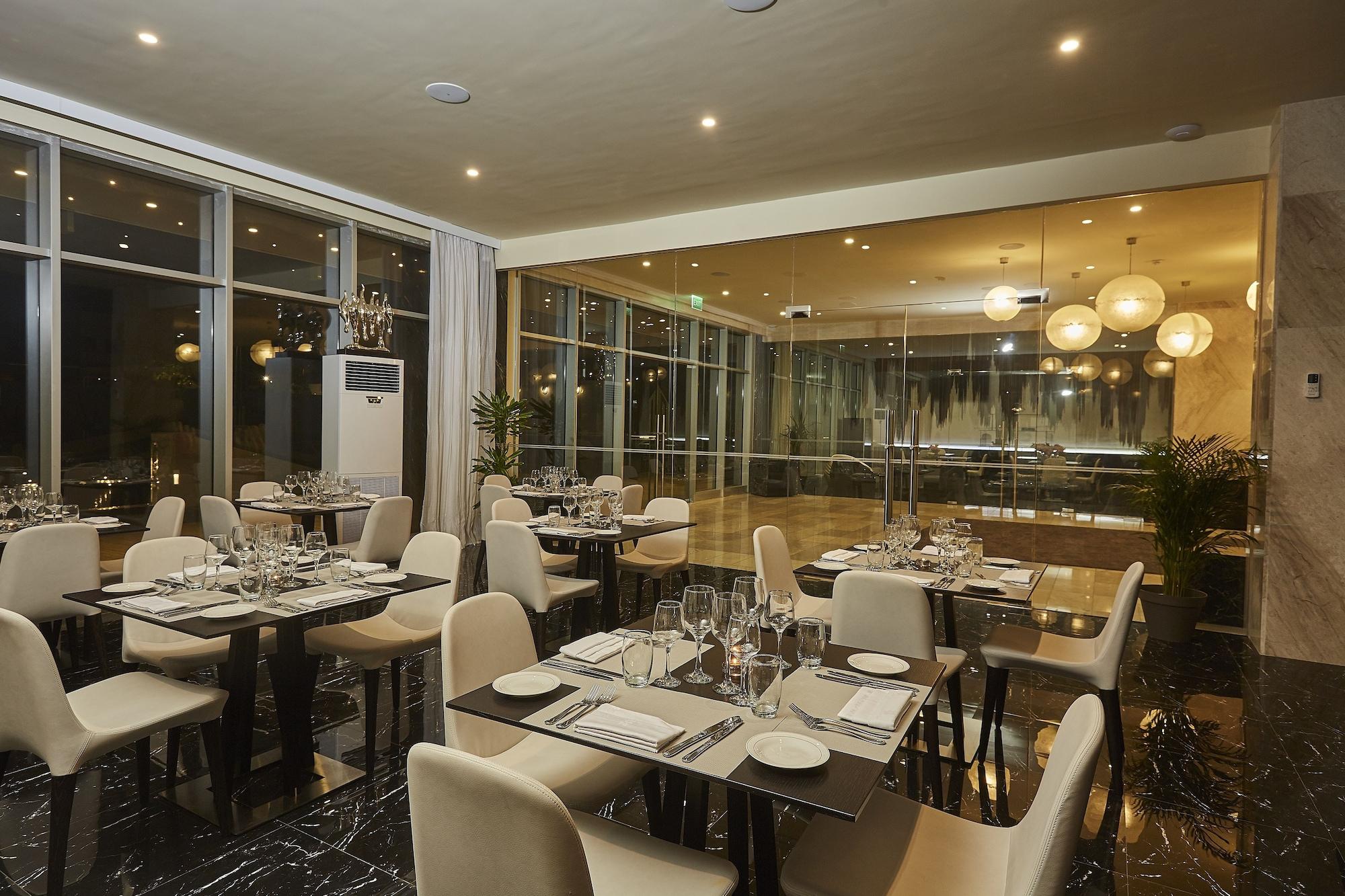 Restaurant Kwarleyz Residence Hotel & Suites
