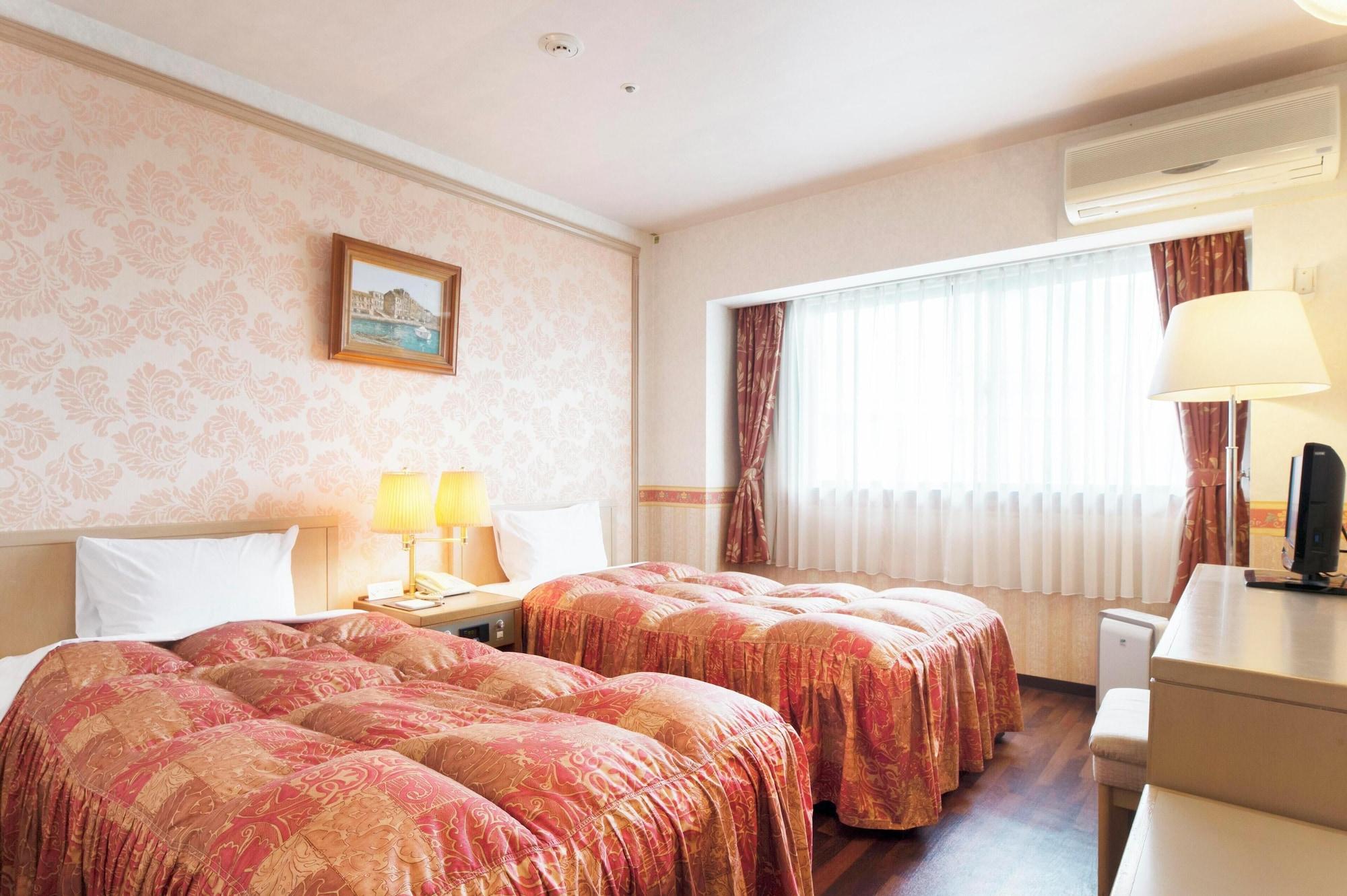Habitación Izukogen Wanwan Paradise Condominium