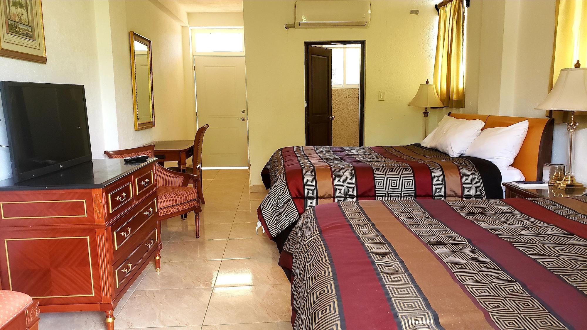 Habitación Manoir Adriana Hotel