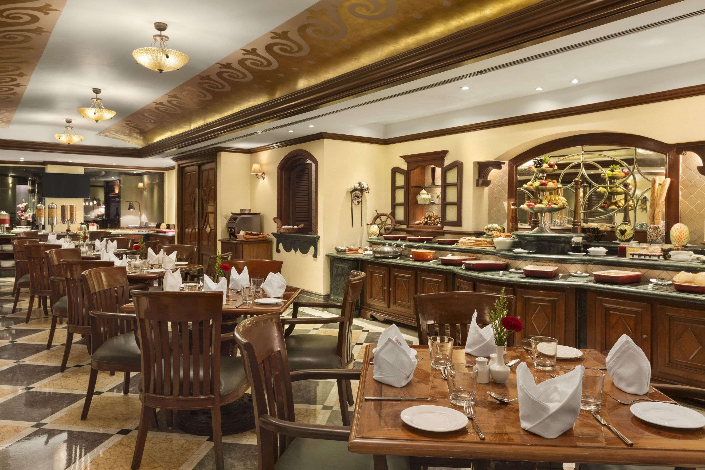 Restaurant Ramada Plaza by Wyndham Palm Grove