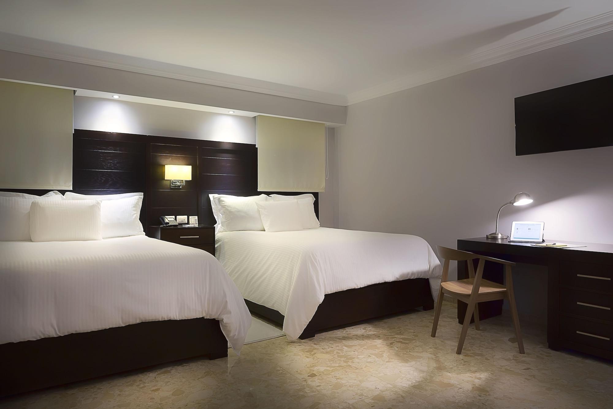 Habitación Plaza Florida Suites