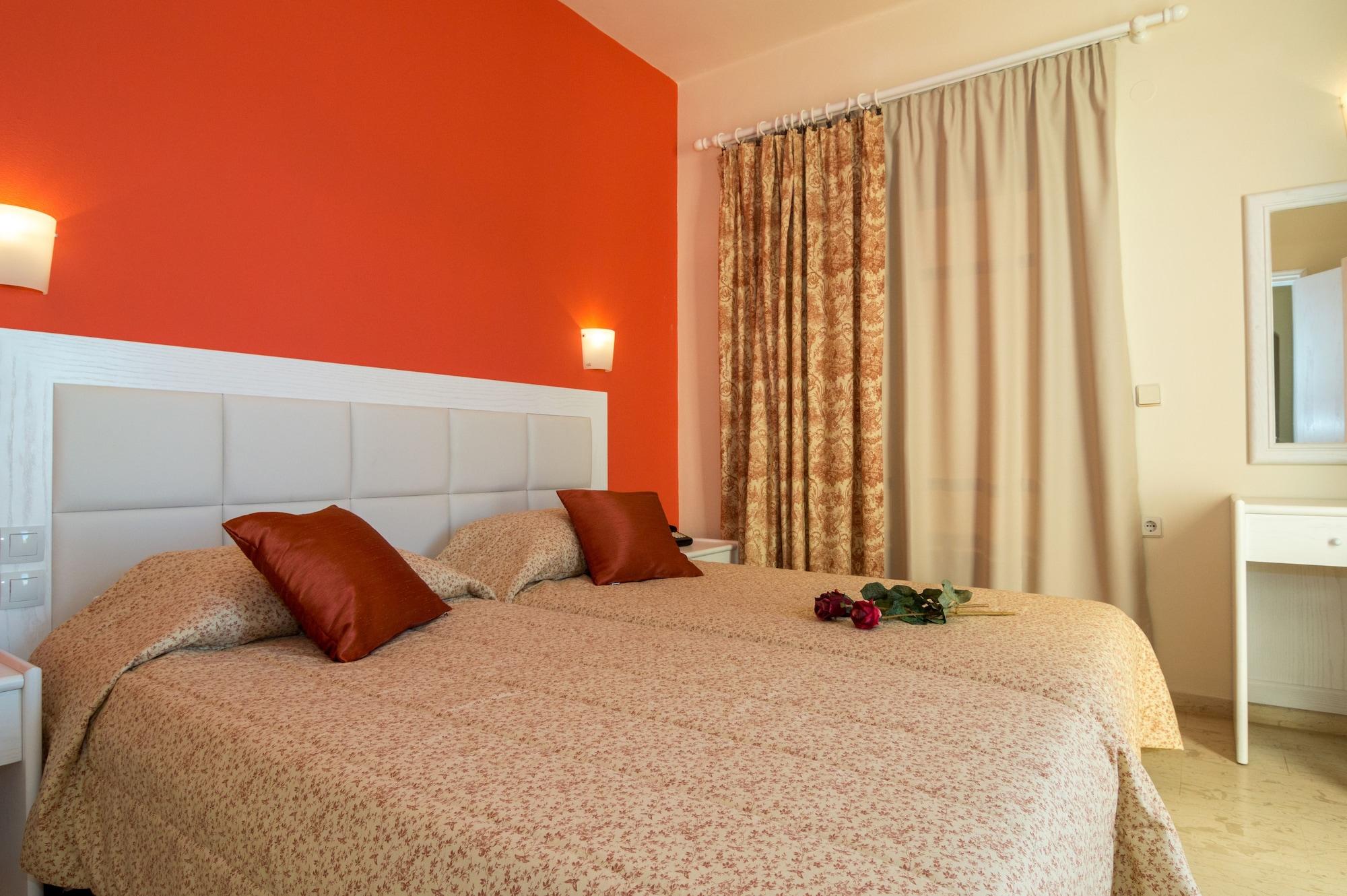 Habitación Manolis Apartments