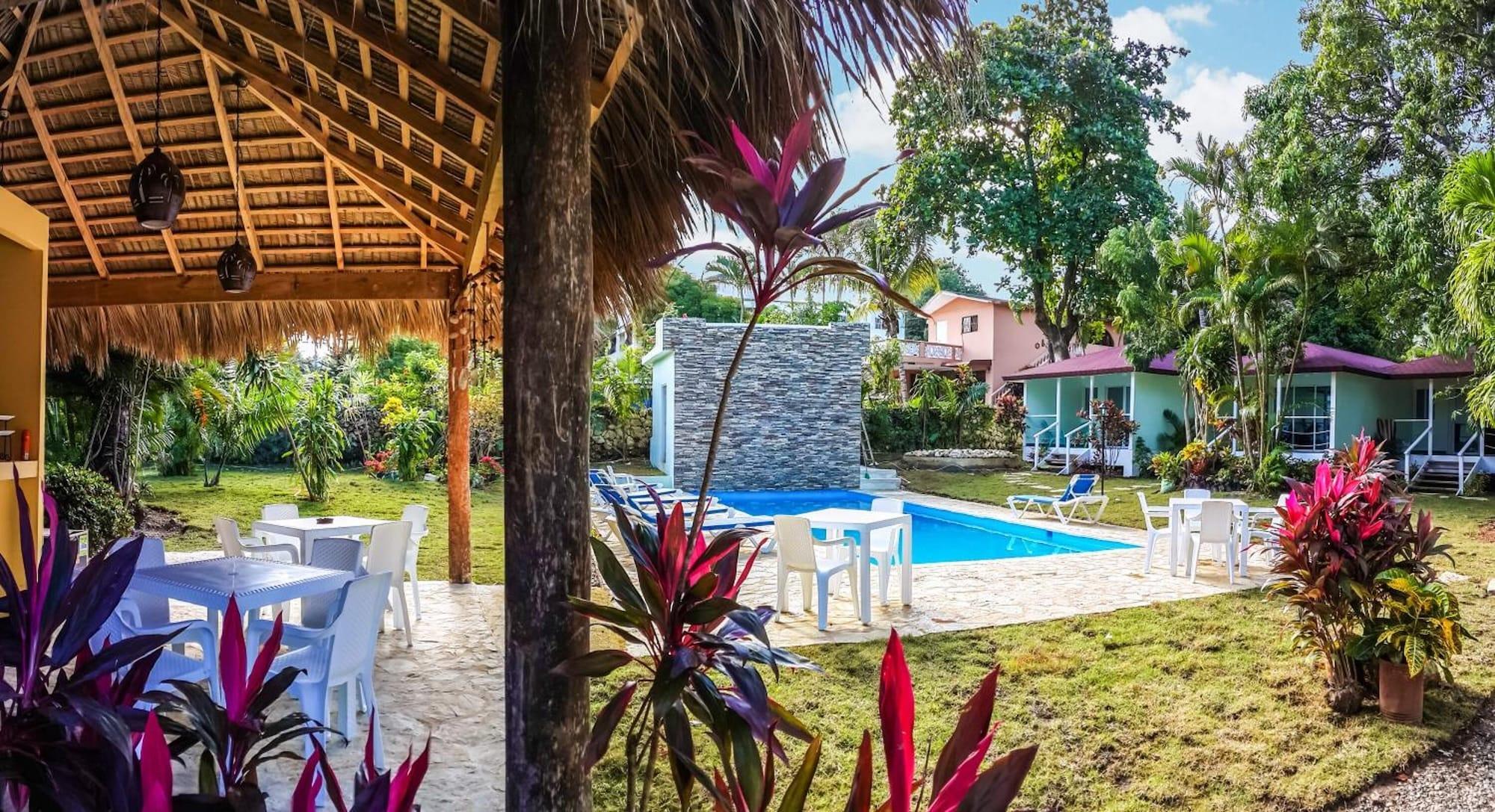 Vista Piscina Bungalow Natura Village