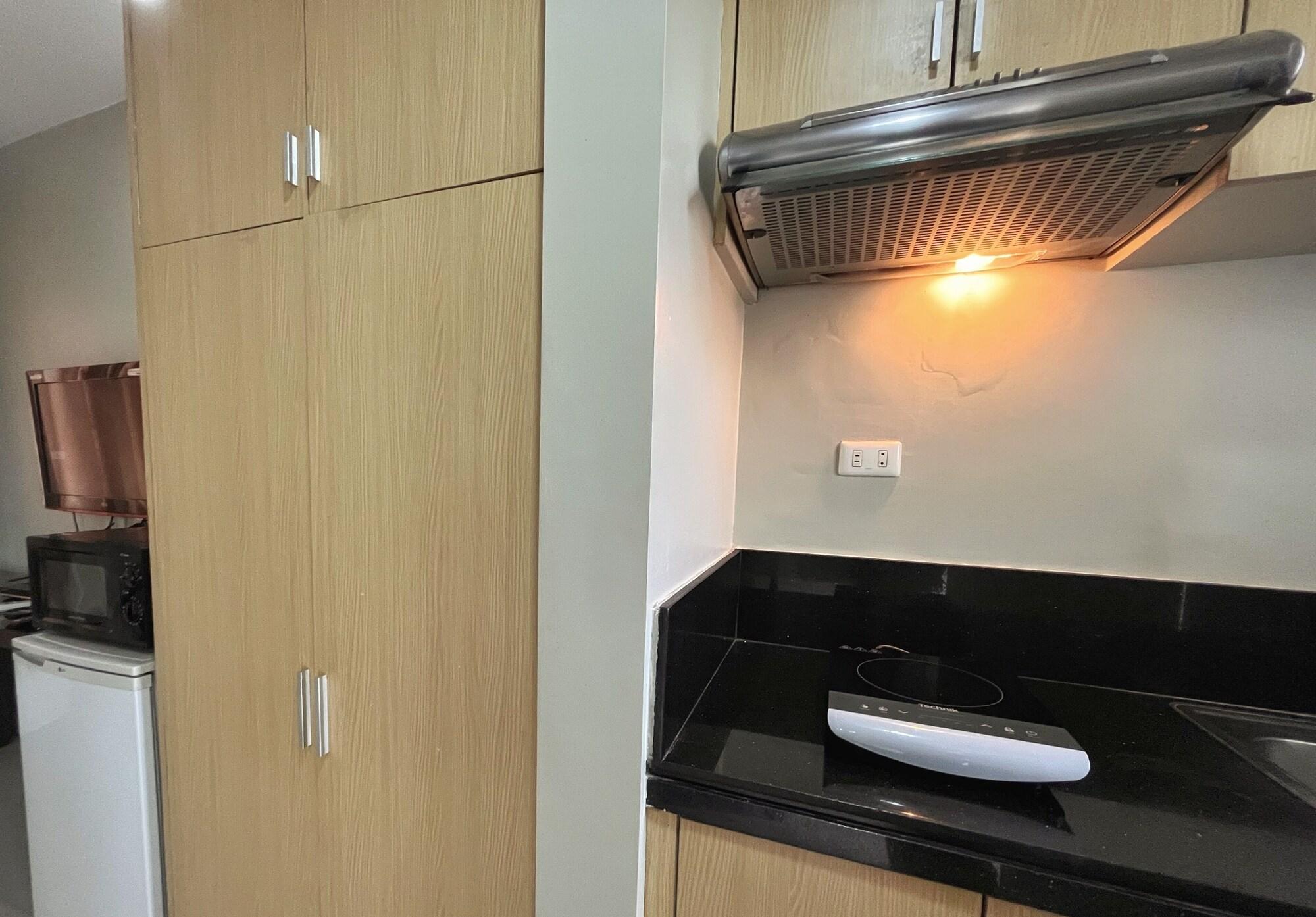 Equipamiento de Habitación Rumi Apartelle Hotel