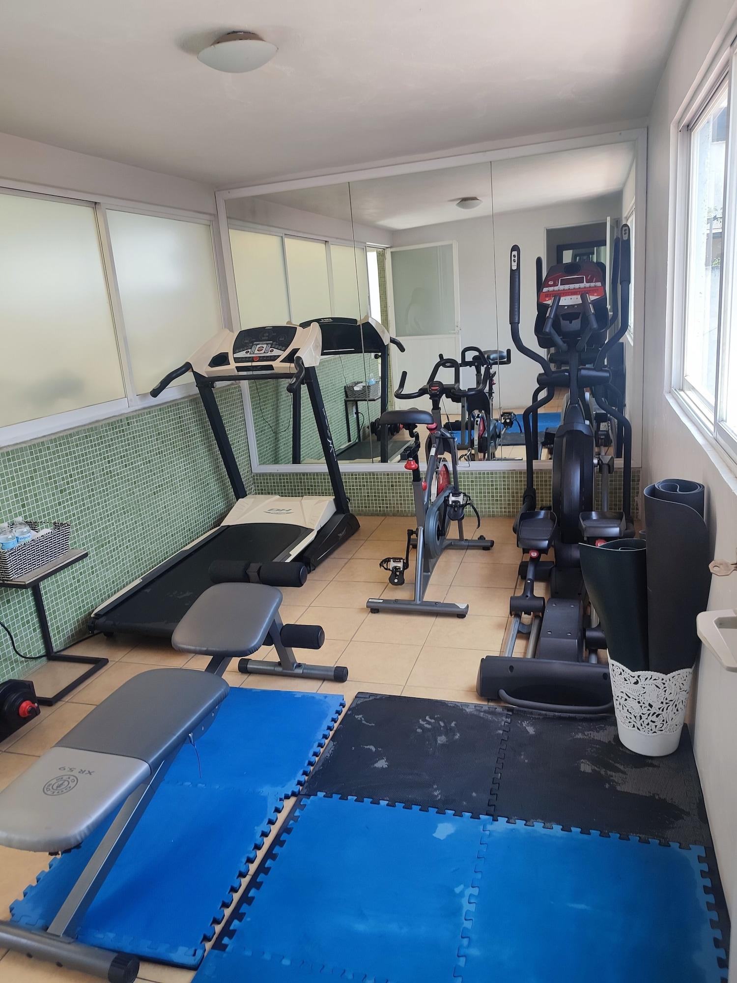 Gimnasio Lombardo Suites