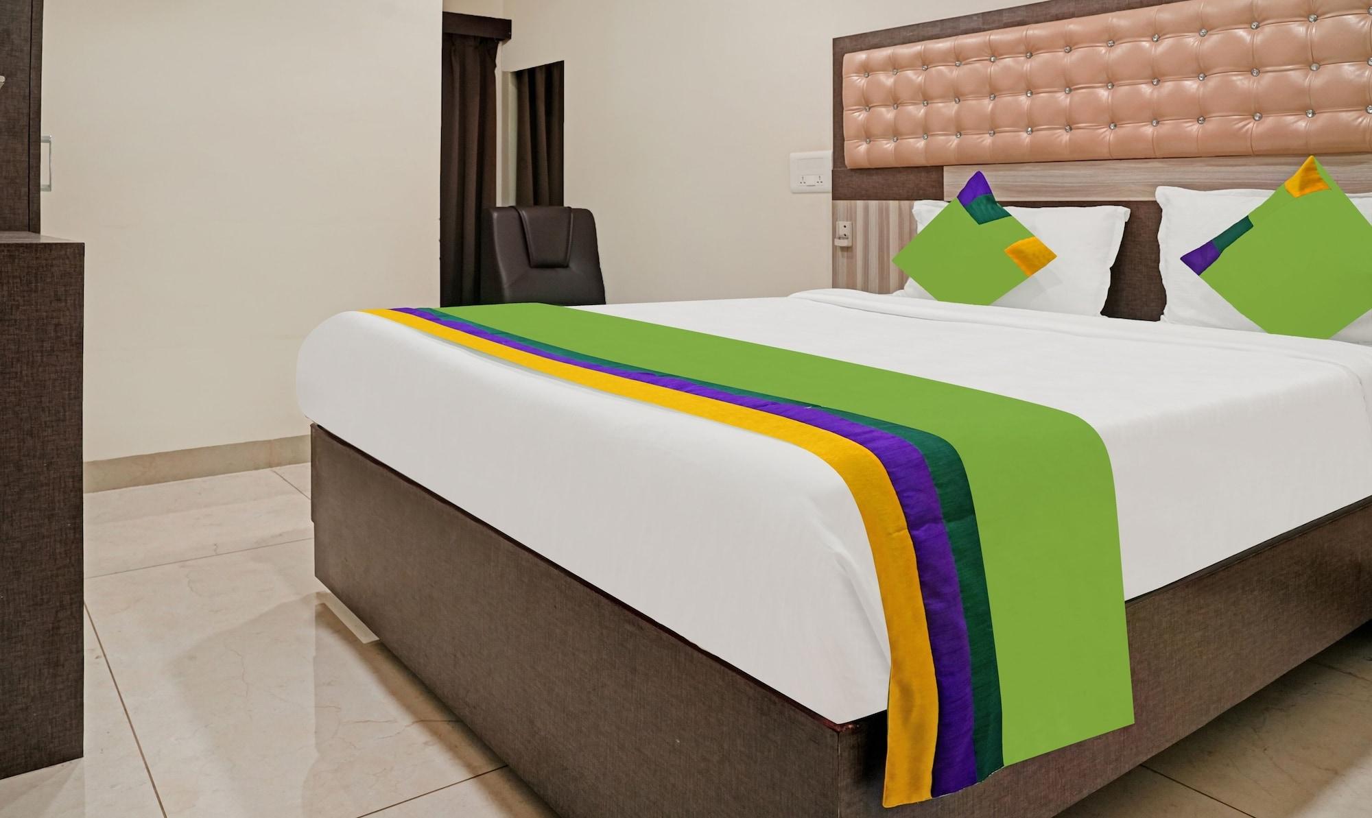 Varios Treebo Trend JSN Grand