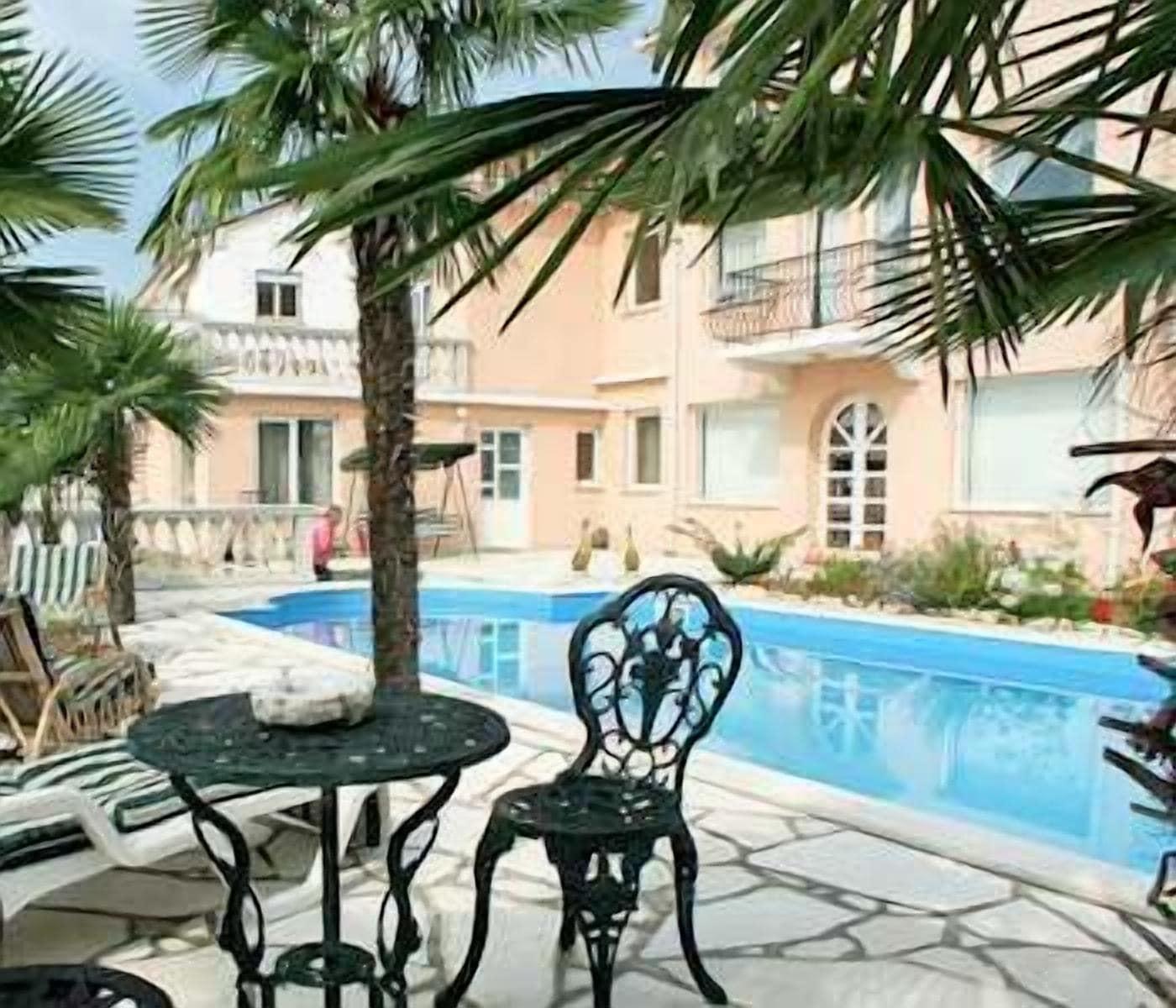 Vista Piscina Villa Palme