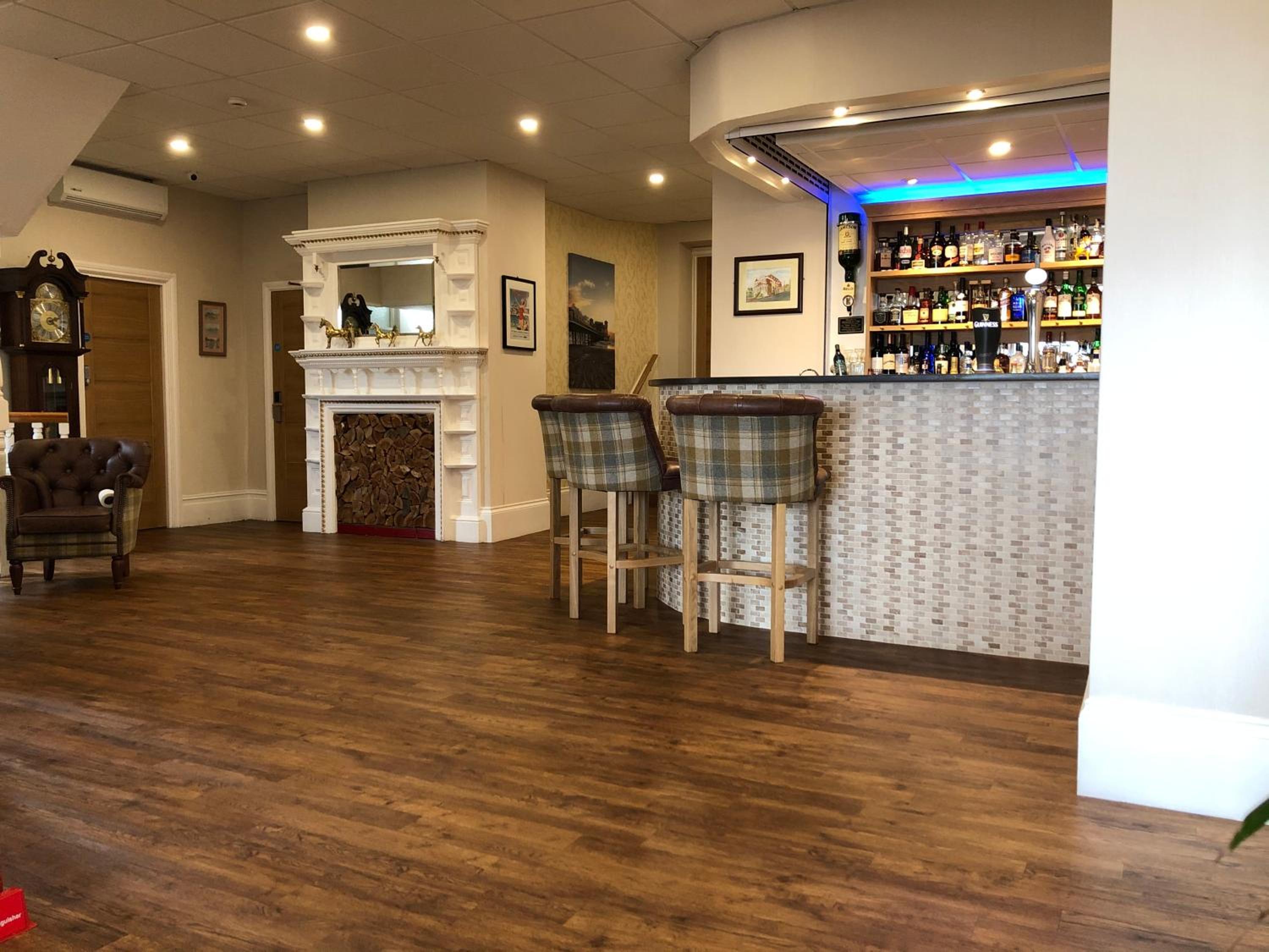 Bar/Salón Queenswood Hotel