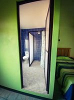 Alquiler Vacacional - Comfortable double room with outdoor balcony.