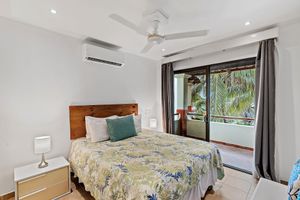 Renta Vacacional - Colorful & Private 2-Bedroom Condo Just a Short Walk from the Beach