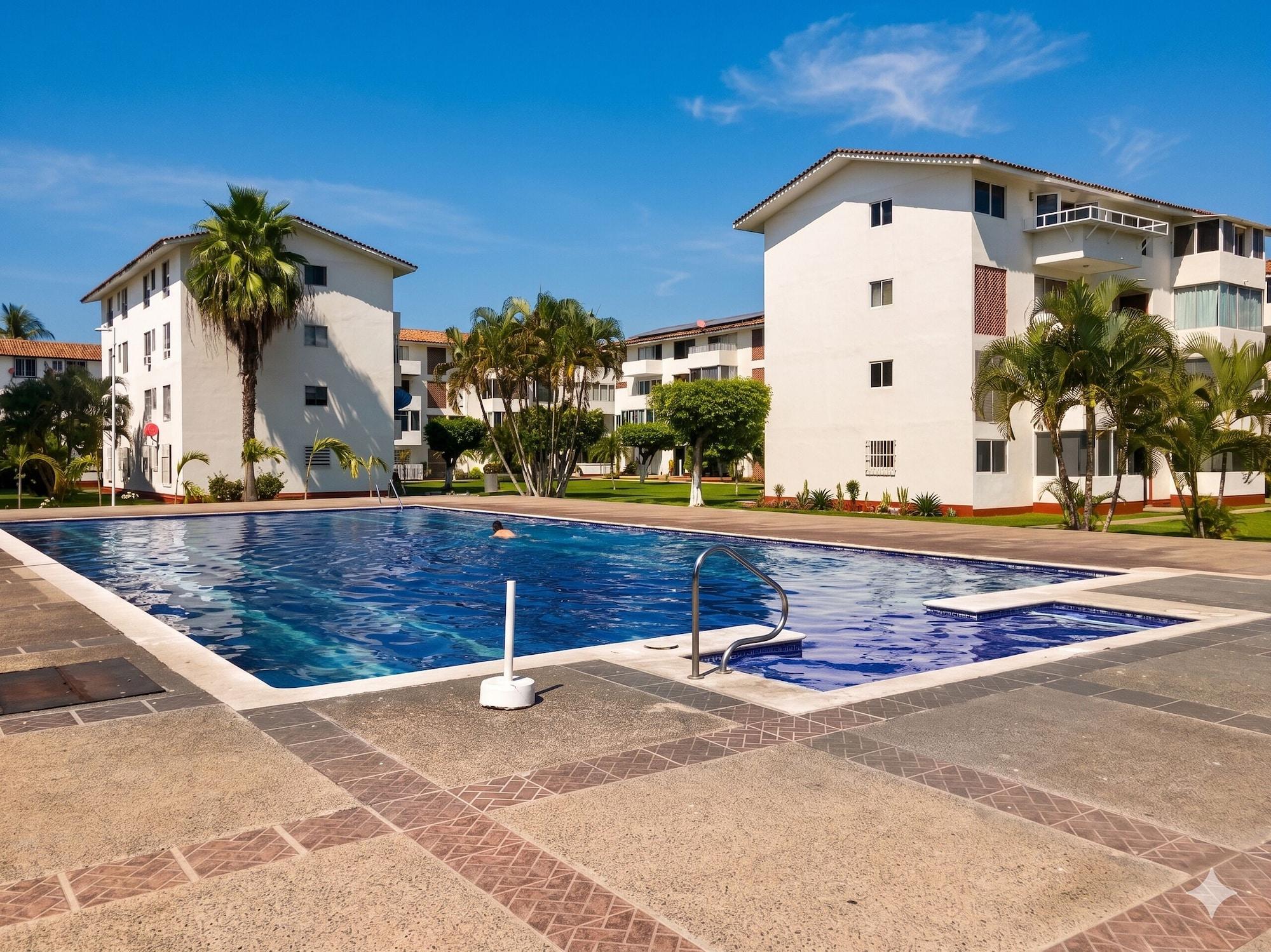 Vista Piscina La Marina Condominios by Monyxbnb