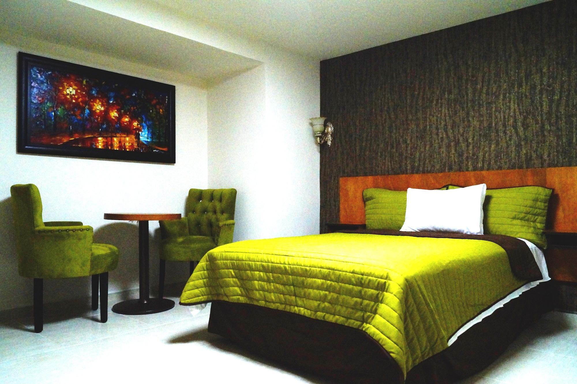 Habitación Royal Madero Inn