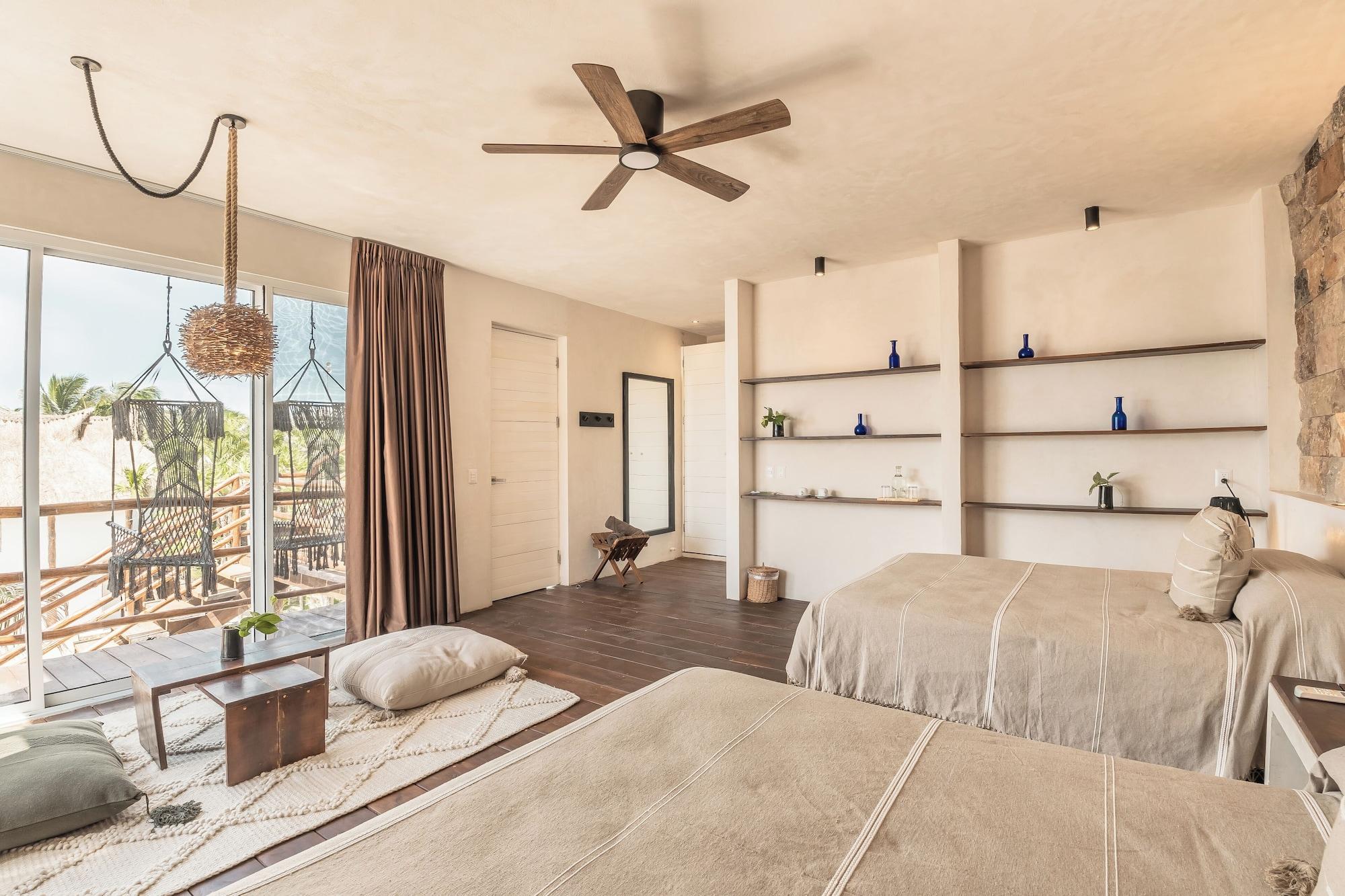 Habitación NIKEN BEACHFRONT HOTEL