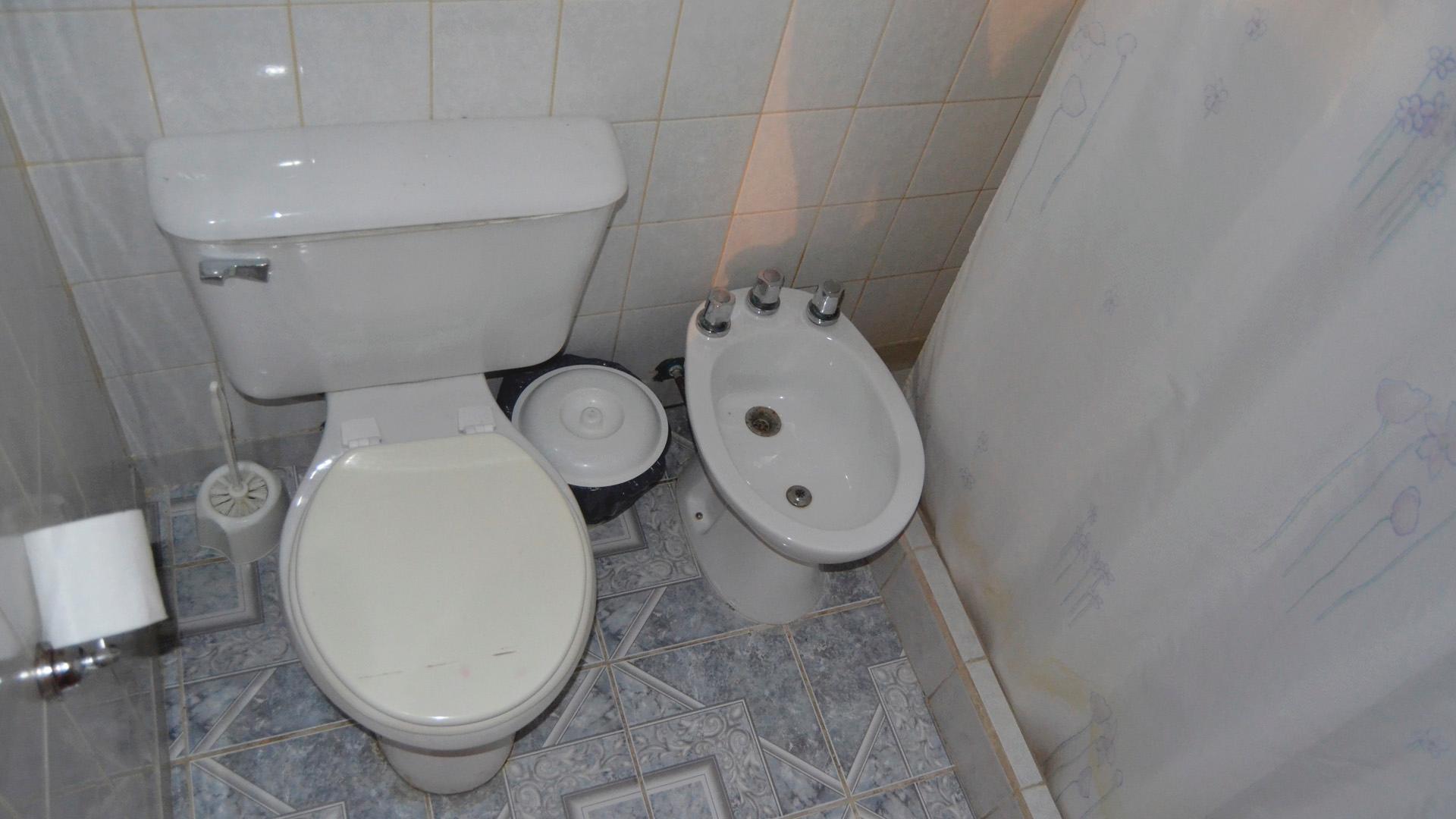 Baño Hostel Flores del Sur