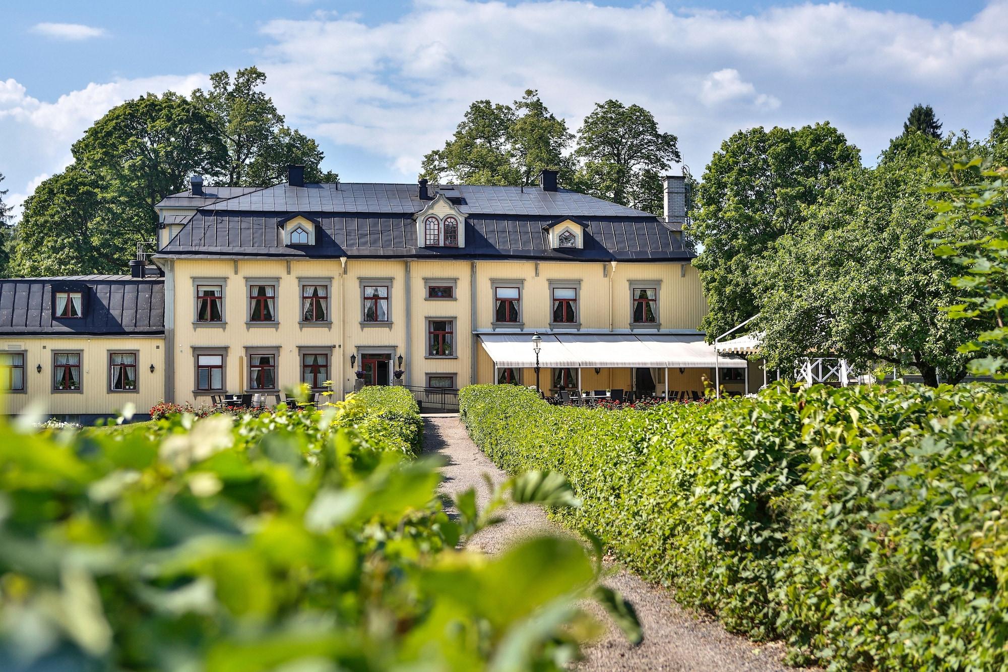 Vista Exterior Hennickehammars Herrgård