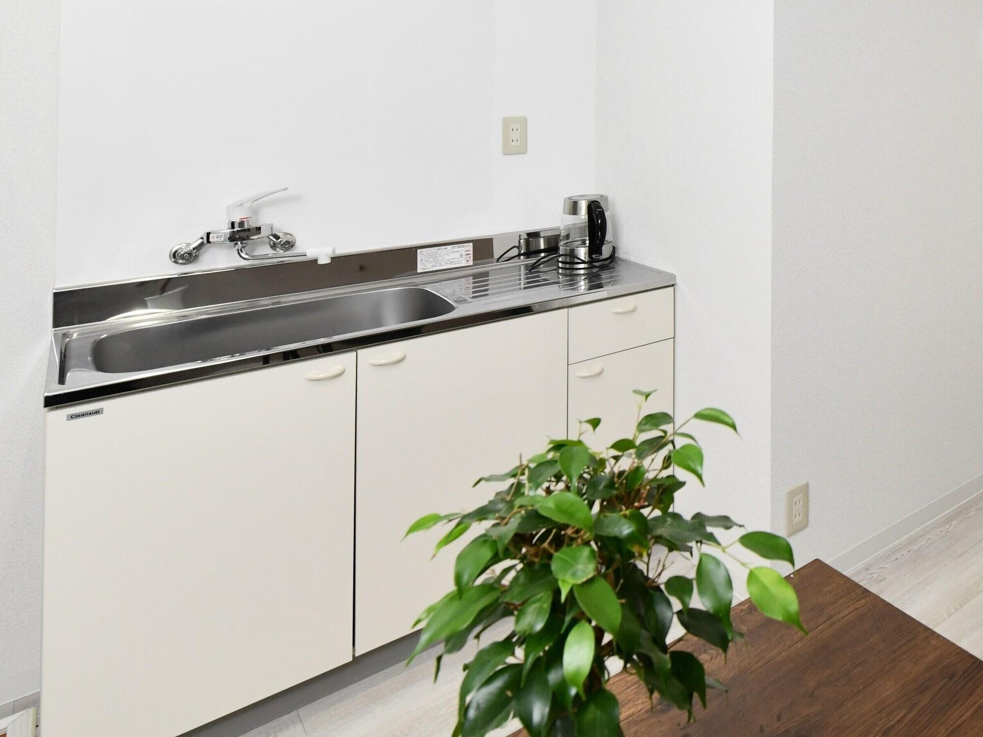 Equipamiento de Habitación Suzumaru Hotel - Hostel