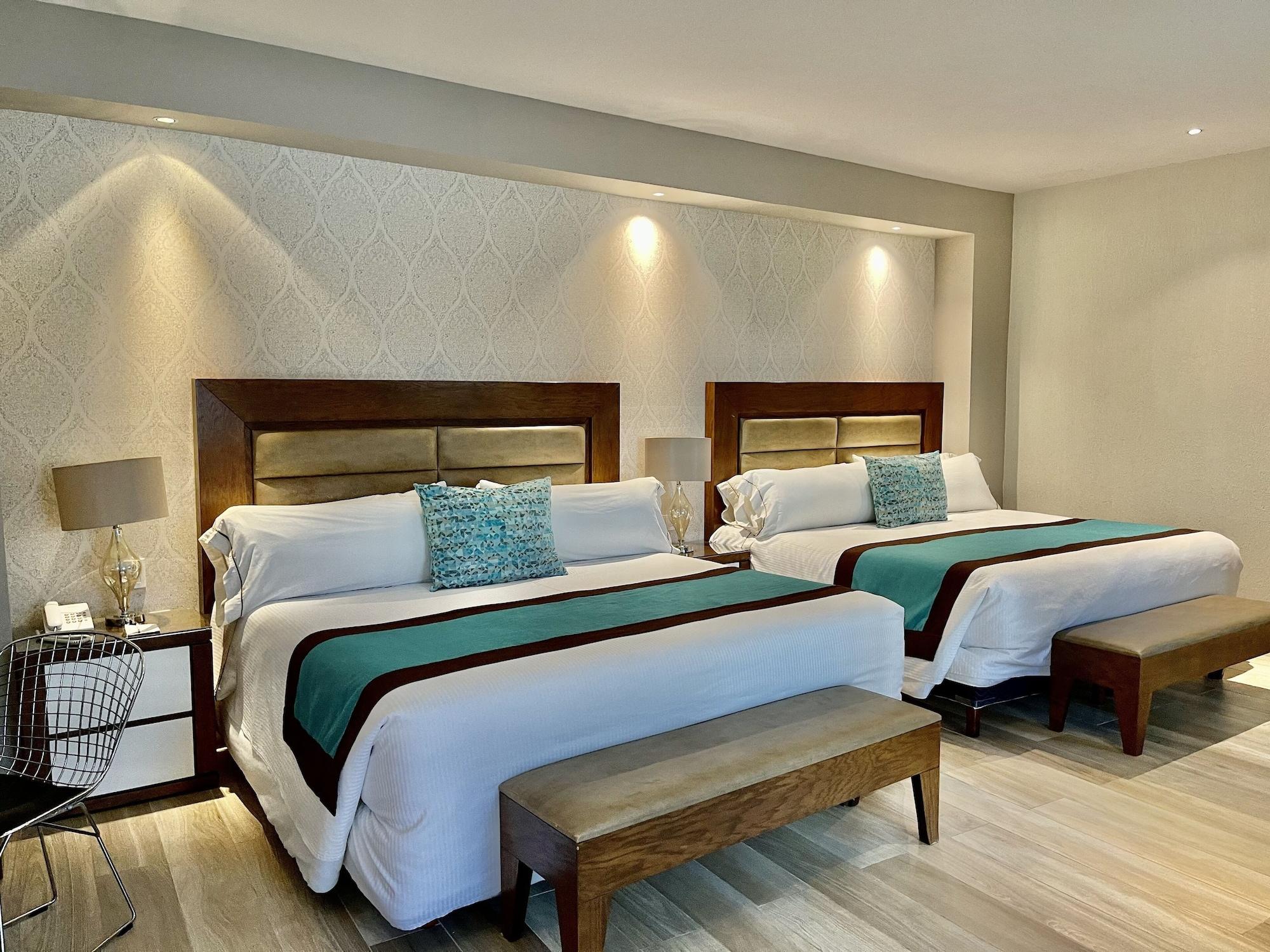 Habitación Áurea Hotel & Suites
