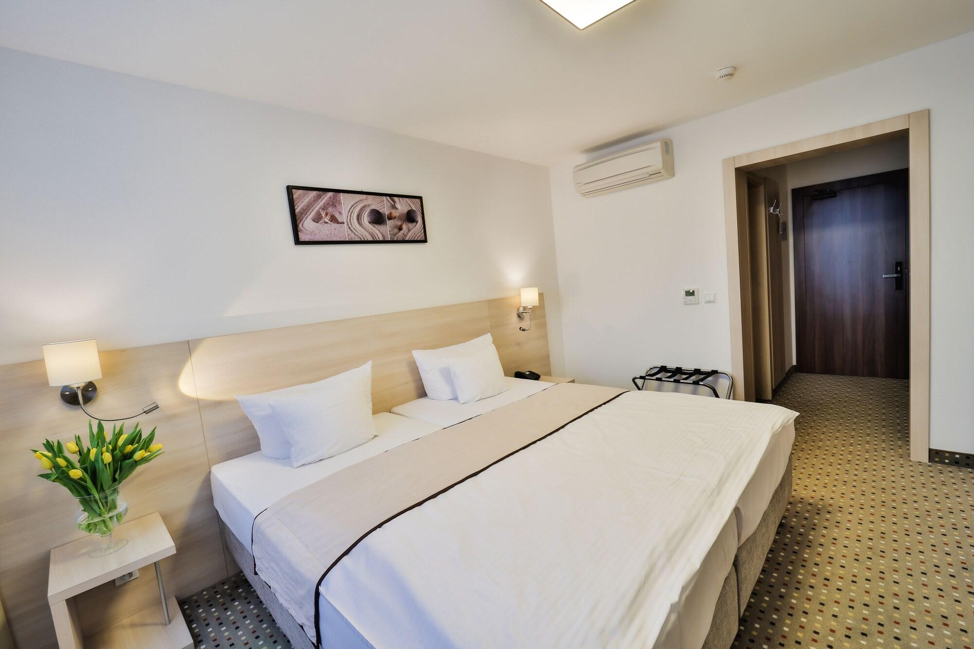 Habitación Hotel Metropol